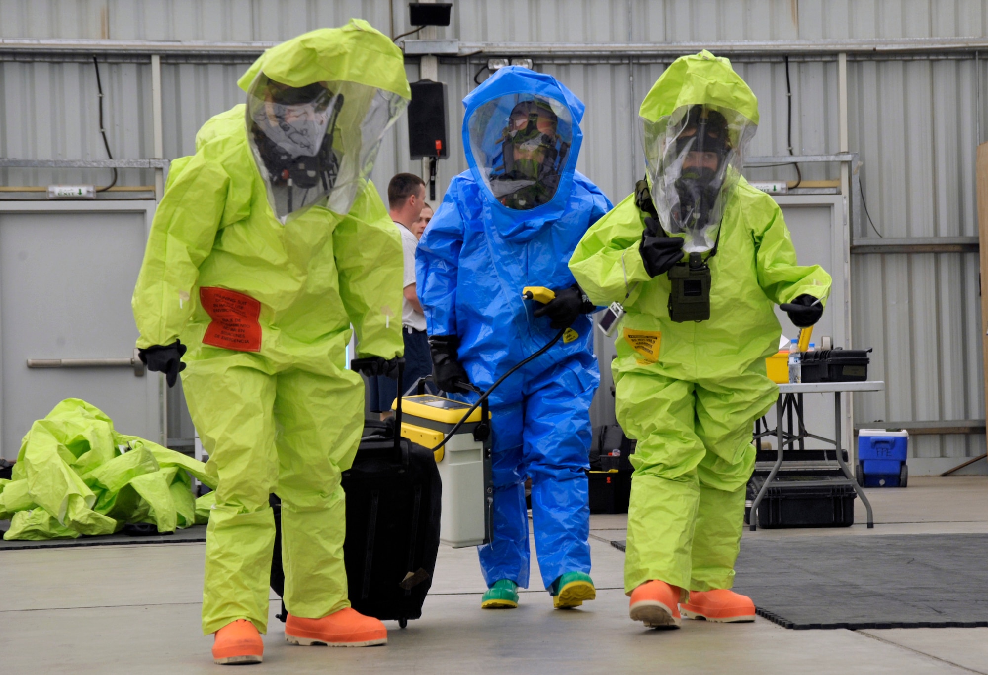 Senior Airman Samantha Strege (left), 380th Civil Engineer Squadron emergency management journeyman, Staff Sgt. Benjamin Sybert, 380th Medical Group NCO in Charge Bioenvironmental Engineering, and Senior Airman Kathryn Benoit, 380th CES emergency management journeyman, participate in a hazardous response exercise at an undisclosed location in Southwest Asia Aug 7. (U.S. Air Force Photo/Tech. Sgt. April Wickes) 