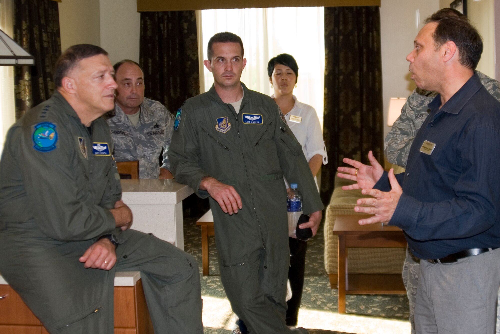 KUNSAN AIR BASE, Republic of Korea -- Samuel Sansone, 8th Force Support Squadron lodging manager, discusses the improvements made to base lodging here with Gen. Gary North, Pacific Air Forces commander, Aug. 8 during a visit to the base August 8-10.  General North visited several areas of the base during his stay including the base exchange, bowling alley and fitness center. He also attended a dinner with Wolf Pack first sergeants and chiefs. (U.S. Air Force photo/Staff Sgt. Jonathan Pomeroy)