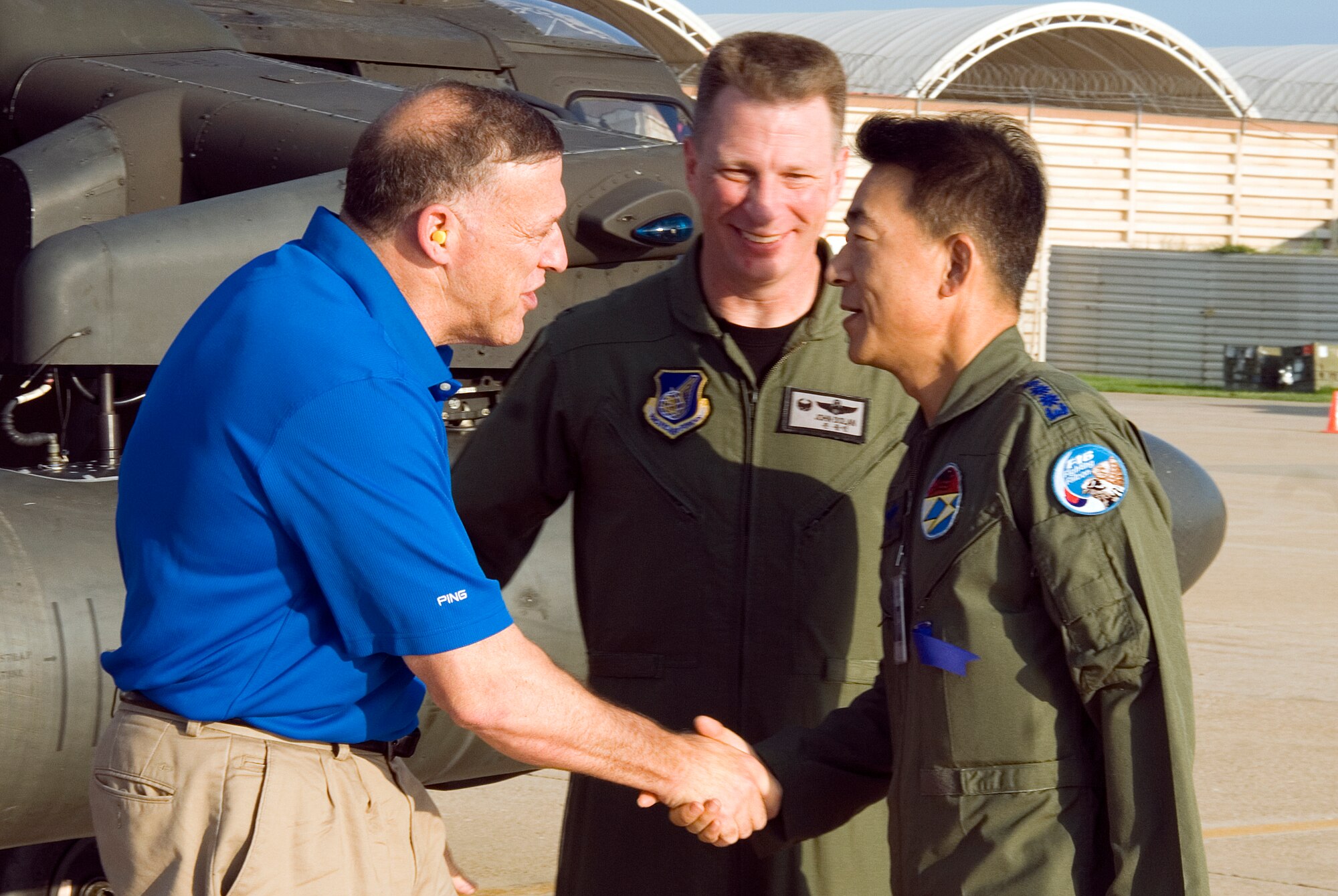KUNSAN AIR BASE, Republic of Korea --   General Gary North, Pacific Air Forces commander, greets Col. Jae Hun Choi, 38th Fighter Group commander, after arriving on base August 8.  General North visited several areas of the base during his stay including the BX, bowling alley and fitness center. (U.S. Air Force photo/Staff Sgt. Jonathan Pomeroy)