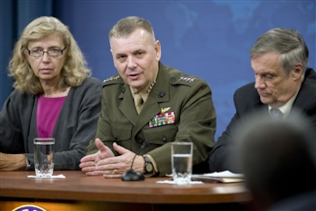 Director of Cost Assessment and Program Evaluation Christine H. Fox (left), Vice Chairman of the Joint Chiefs of Staff Gen. James E. Cartwright Jr. and Under Secretary of Defense Comptroller Robert F. Hale (right) answer questions from the press during a press conference in the Pentagon on Aug. 9, 2010.  