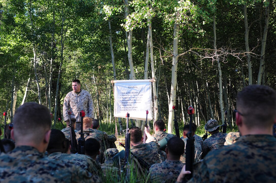 Staff Sgt. Chad Marquett, Marine Corps Mountain Warfare Training Center instructor, teaches a class on mountain survival to Marines from the Marine Corps Air Station in Yuma, Ariz., and 2nd Battalion, 5th Marine Regiment, at MWTC approximately 20 miles northwest of Bridgeport, Calif., Aug. 10, 2010. The Marines from Yuma and 2/5 supported 2nd Battalion, as well as 1st Battalion, 5th Marine Regiment, during the predeployment training. Both battalions are scheduled to deploy to Afghanistan in April 2011.