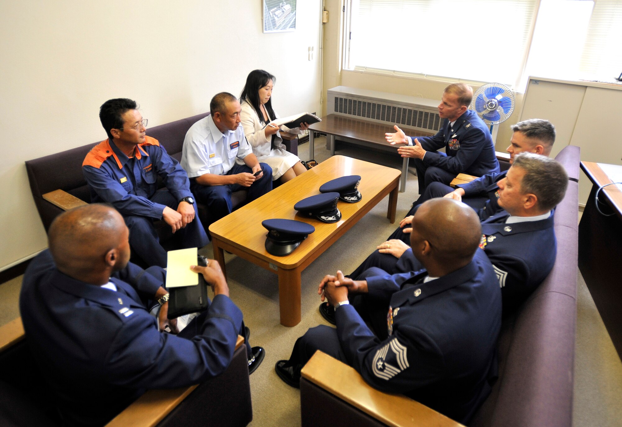 Col. RC Craig, 35th Fighter Wing commander, Major Todd Wydra, 35th Maintenance Squadron commander and Chief Master Sgt. Russell Hastings, 35th Fighter Wing command chief, speak with Hachinohe Fire Department Aug. 9. Col. Craig, Major Wydra and Chief Hastings also visited the Hachinohe Police Department, Japanese National Police and Coast Guard to thank them for their rescue efforts in saving five Misawa Airmen from Tanahashi Cove. (U.S. Air Force photo/Staff Sgt. Chad Strohmeyer)