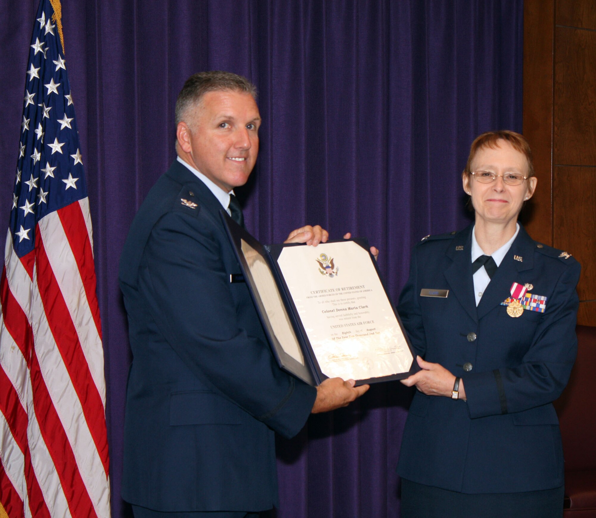 TRAVIS AIR FORCE BASE, Calif. -- Col Donna M. Clark, 349th Air Mobility Wing, JA, retires, Aug. 8, 2010. (U.S. Air Force photo/Maj Todd Boyer)