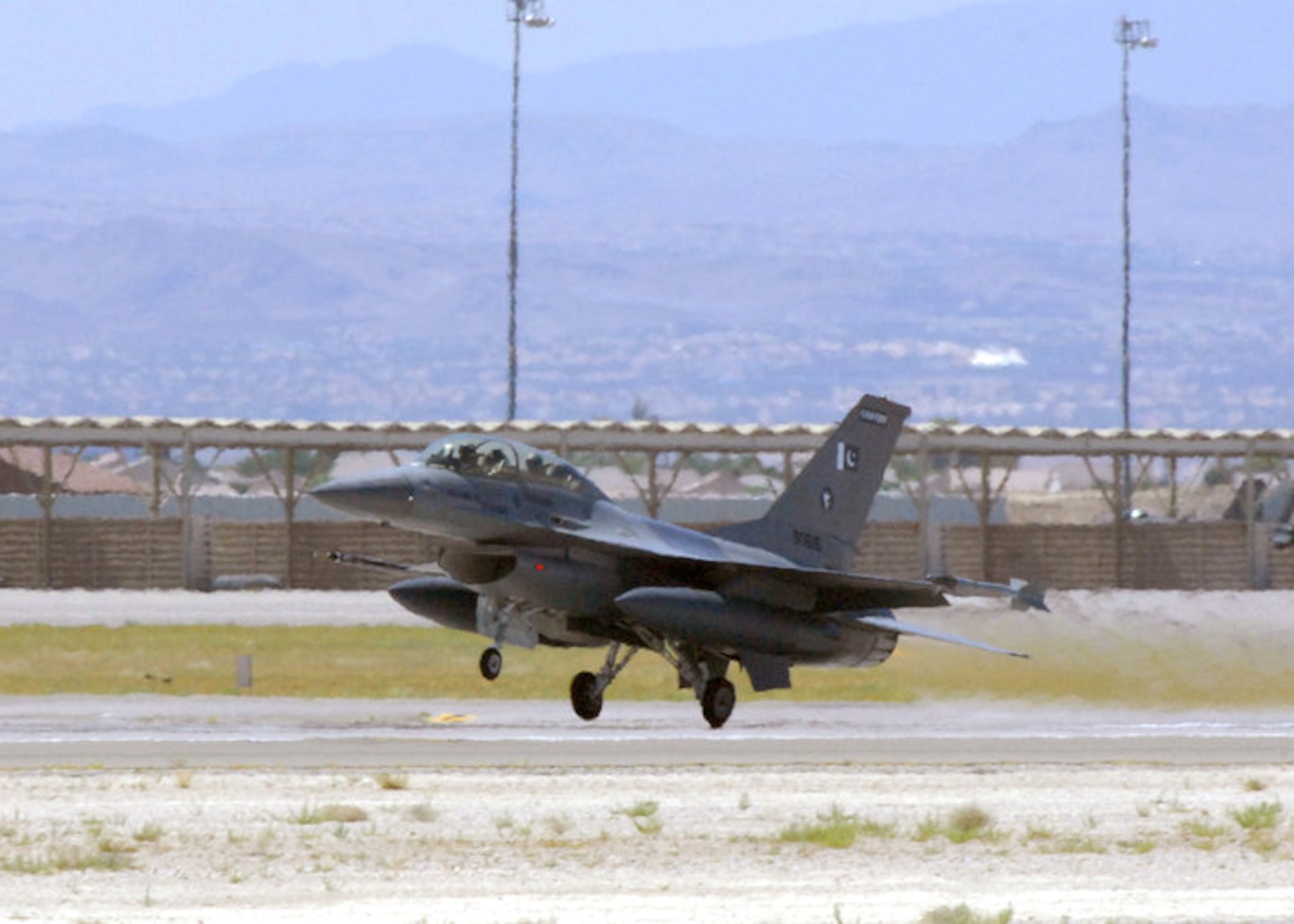 An F-16 from the Pakistan Air Force takes off the runway for Exercise Red Flag 10-4 July 21, 2010, at Nellis Air Force Base, Nev. Red Flag is a realistic combat training exercise involving the air forces of the U.S. and its allies. (U.S. Air Force photo/Airman 1st Class Daniel Phelps)