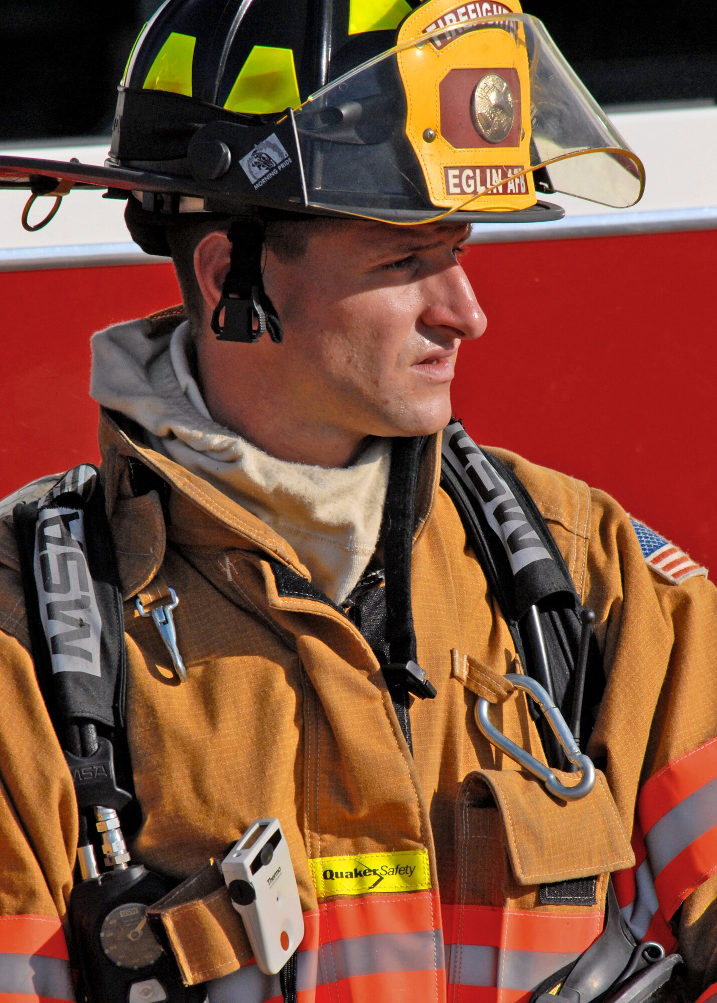 Airman 1st Class Patrick Klebaur, 96th Civil Engineer Squadron, waits for orders during Nuclear Accident Response Exercise Aug. 11 at Eglin Air Force Base, Fla.  This exercise assessed the ability of base personnel to support a request from Department of Energy  and respond to a major accident. In the scenario, while securing the vehicles from a DoE convoy, the DoE truck experienced an engine fire and two DoE personnel suffered severe burns while trying to extinguish the fire. Emergency personnel responded to the situation, secured the scene, transported the victims and put out the fire.  (U.S. Air Force photo/Samuel King Jr.)