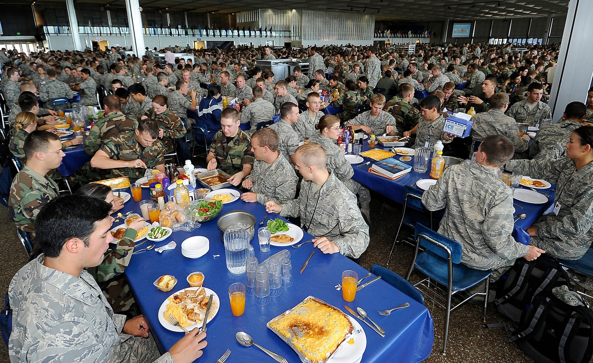 Cadets eat lunch at Mitchell Hall Aug. 10, 2010, during the first full week of the 2010-2011 school year at the Air Force Academy in Colorado Springs, Colo. The staff at Mitchell Hall serves 4,000 meals for the Cadet Wing three times per day. (U.S. Air Force photo/Rachel Boettcher)