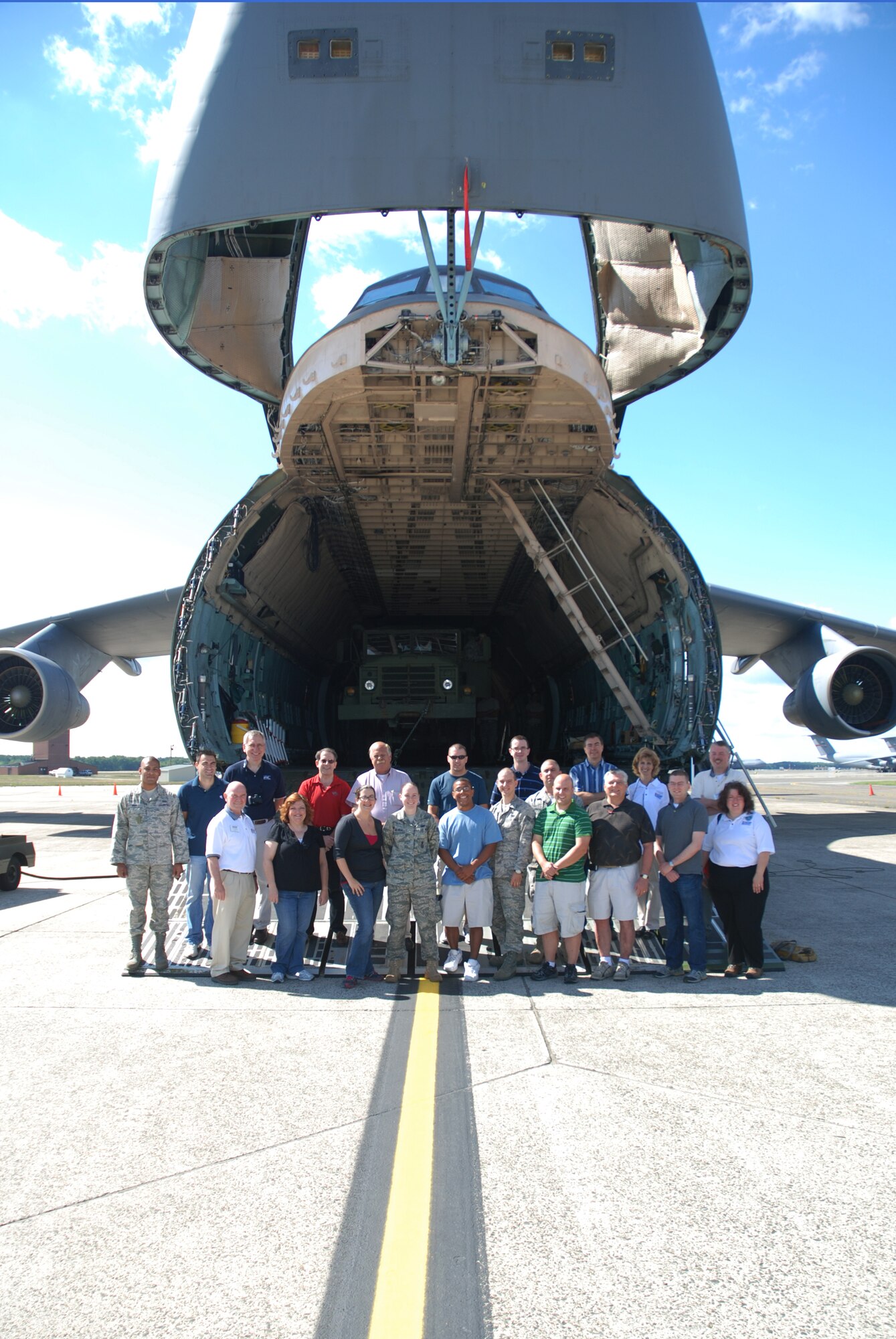 Employers of Westover Reservists visited the Patriot Wing on Saturday of the August A UTA to learn first hand what it means to be a Reservist.  Activities the employers participated in included an Aerial Port demonstration on cargo loading, a tour of the C-5, a flight in the C-5 simulator, a Mission Oriented Protective Posture demonstration and a trip to the Dog Patch training area.