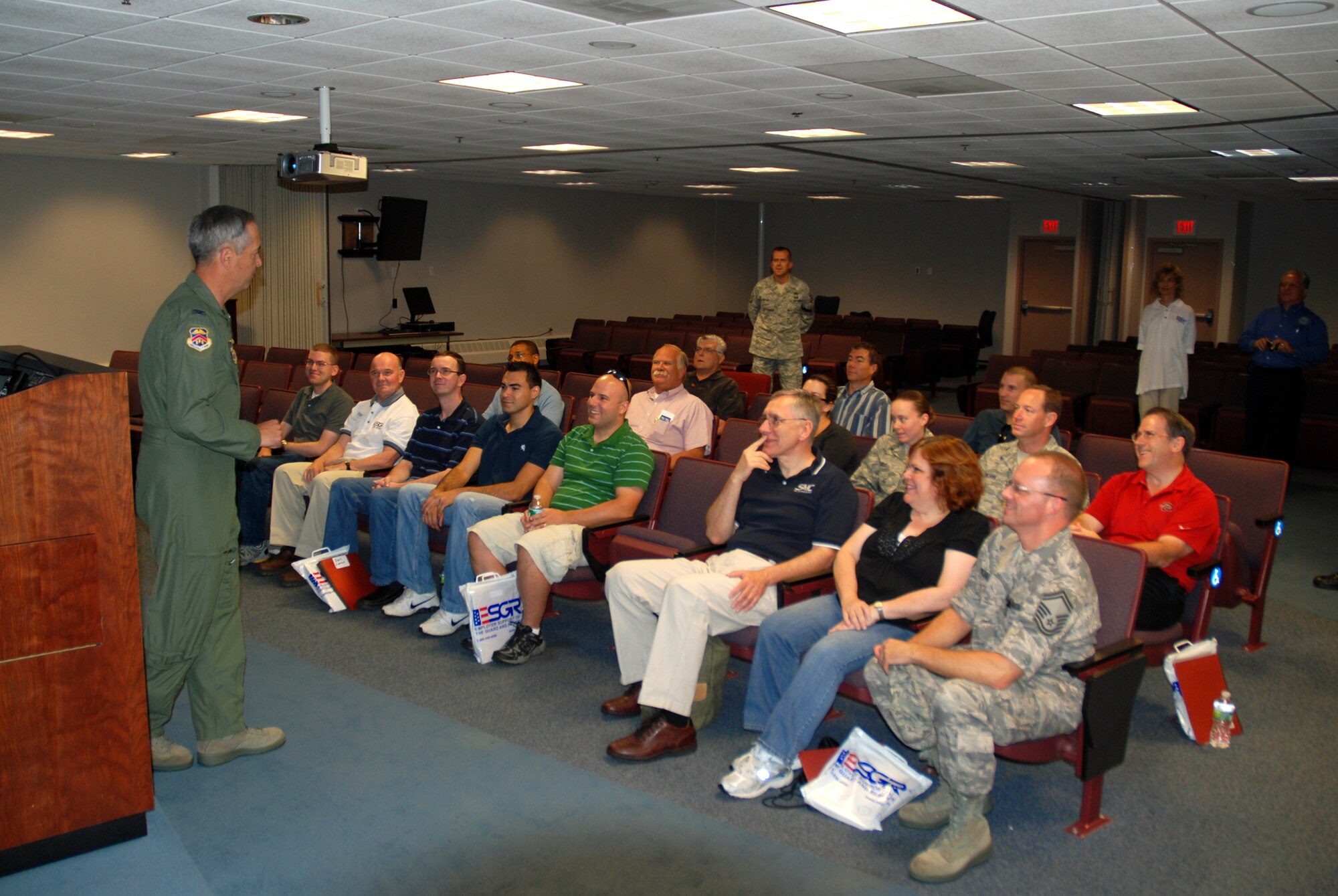 Col. Robert R. Swain Jr., 439th Airlift Wing commander, briefs a group of employers during Employer Day 2010.  Employers of Westover Reservists visited the Patriot Wing on Saturday of the August A UTA to learn first hand what it means to be a Reservist.  