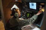 2nd Lt. Elizabeth Thigpen, 562nd Flying Training Squadron, flies the last T-43 simulator at Randolph Air Force Base, Texas, Aug. 11. (U.S. Air Force photo/Rich McFadden)