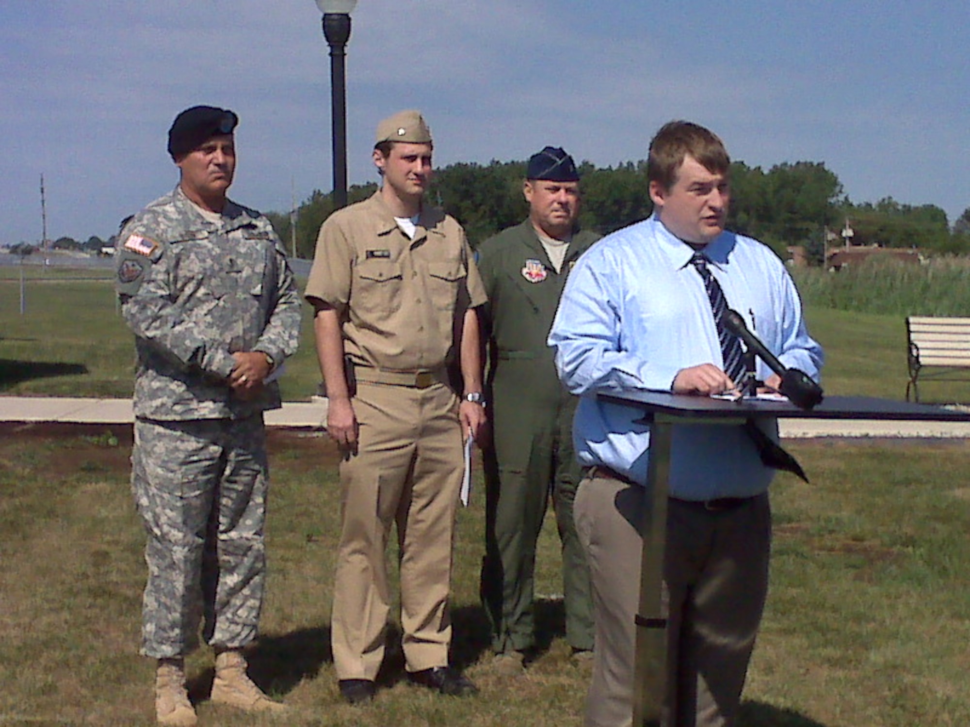 Mr. John Ambrose, epidemiologist with the U.S. Army Public Health Command, addresses media at a subject matter expert availability on Saturday, Aug. 7, at Selfridge Air National Guard Base.  Also shown behind Ambrose are (left to right) Maj. Gen. Kurt Stein, commanding general of TACOM, Lt. Commander (Dr.) Lee Hampton, epdemic intelligence officer with the Centers for Disease Control and Prevention, and Brig. Gen. Michael L. Peplinski, 127th Wing commander and Selfridge Base Commander.  Ambrose and Dr. Hampton discussed the legionnaire's outbreak at Selfridge and provided detailed information regarding the ongoing investigation.