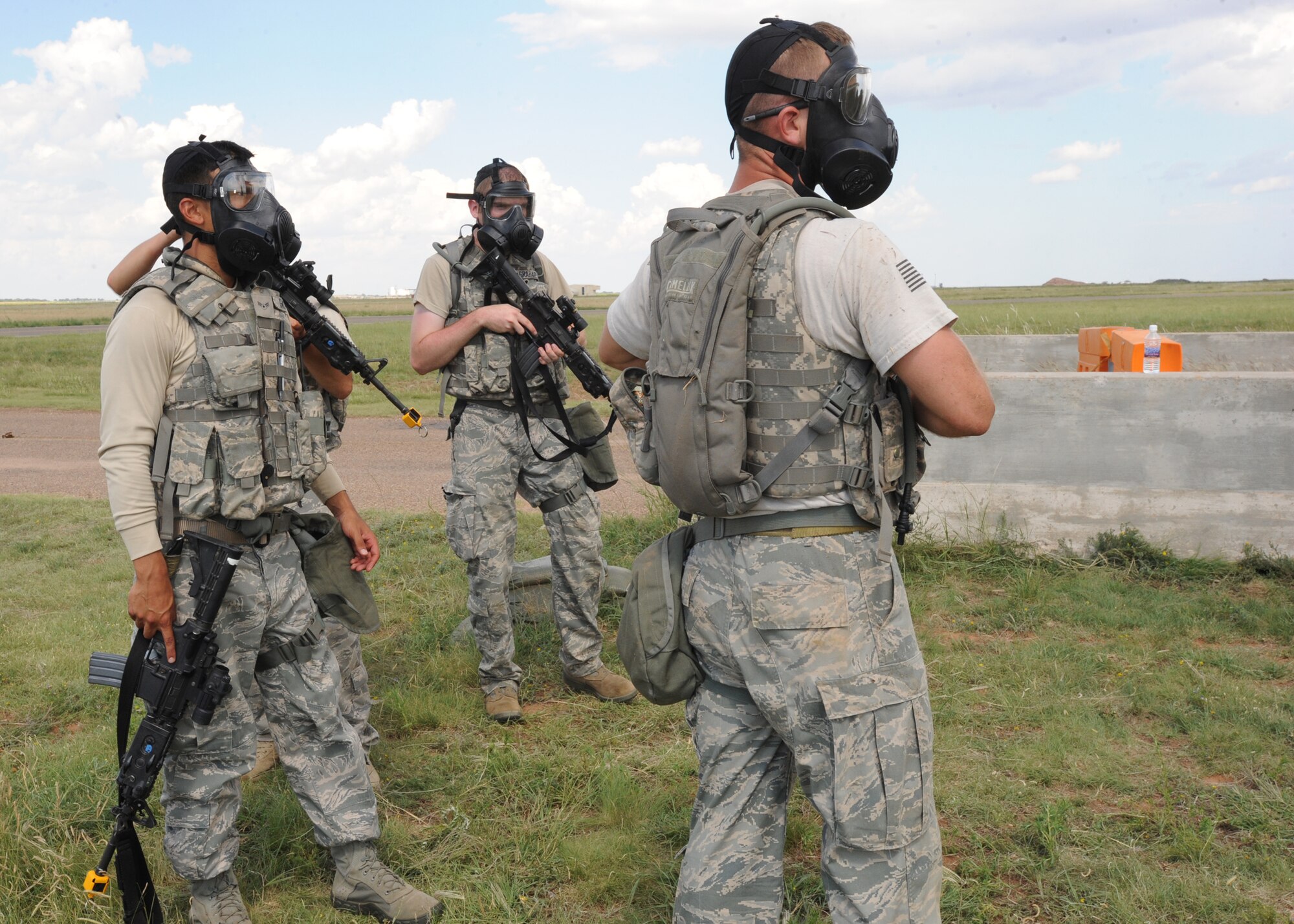 27th Special Operations Security Forces Squadron Airmenlook on as the exercise progresses Aug 10, 2010. Exercises keep Airmen ready to deploy anytime, anywhere to protect America. (U.S. Air Force photo by Airman 1st Class Maynelinne De La Cruz)
