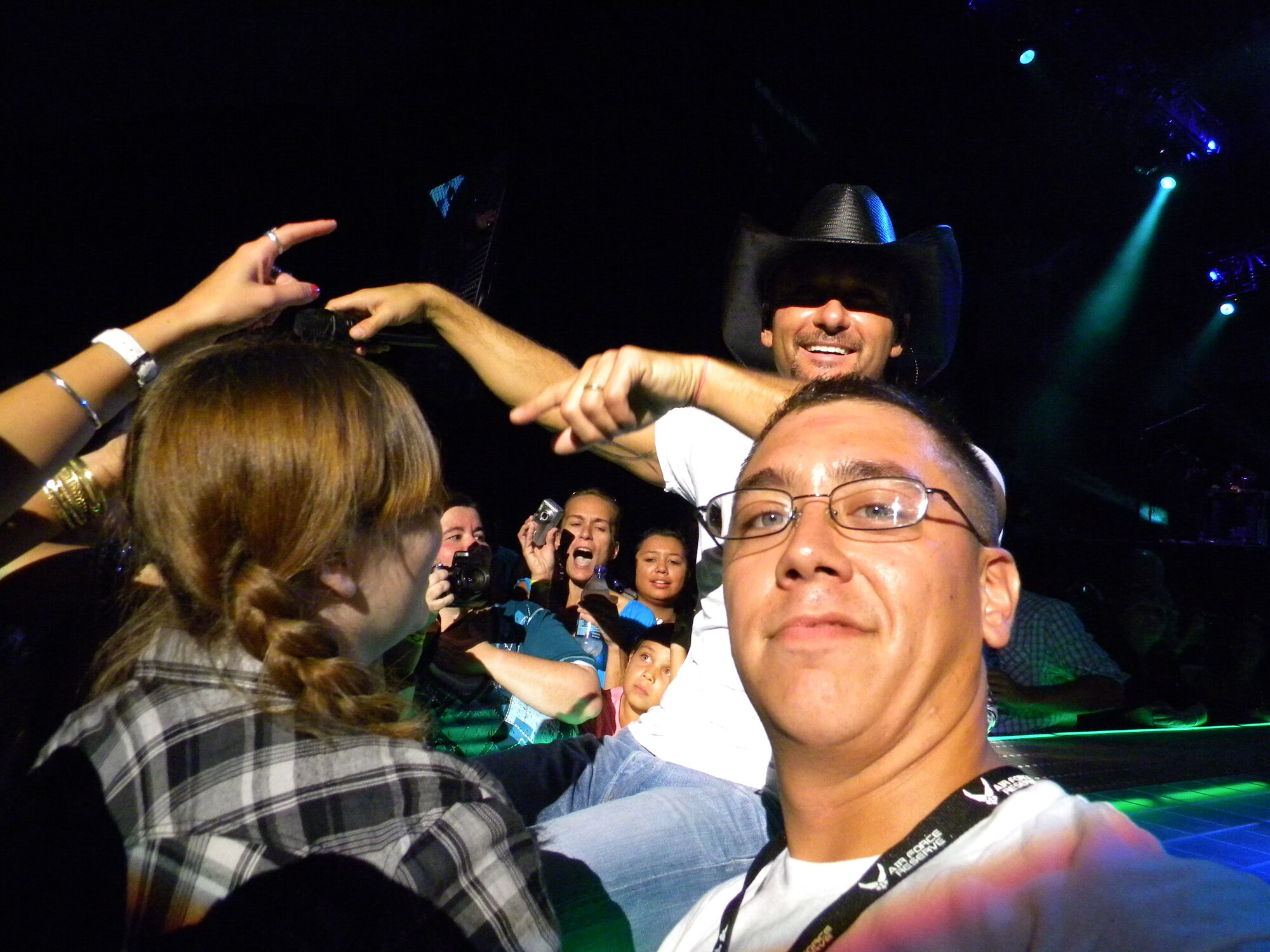 Senior Airman John Taylor from the 914th Civil Engineering Squadron won upgrade tickets for donating money to the Gulf Relief and received front row tickets to the Tim McGraw concert at Darien Lake, NY August 6. 