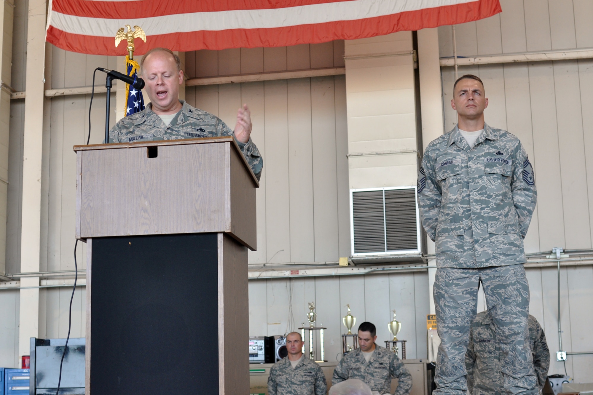Col. Jeffrey S. Mullen, commander, 917th Maintenance Group, Barksdale Air Force Base, La., speaks about Maj. Leo J. Kamphaus Jr., the newly appointed commander of the 917th Maintenance Squadron during the major’s assumption of command ceremony here August 7, 2010. Major Kamphaus comes to the 917th Wing from the 301st Fighter Wing, Naval Air Station Joint Reserve Base, Fort Worth, Texas.  (U.S. Air Force photo/Senior Airman Crystal Marie Jordan)


