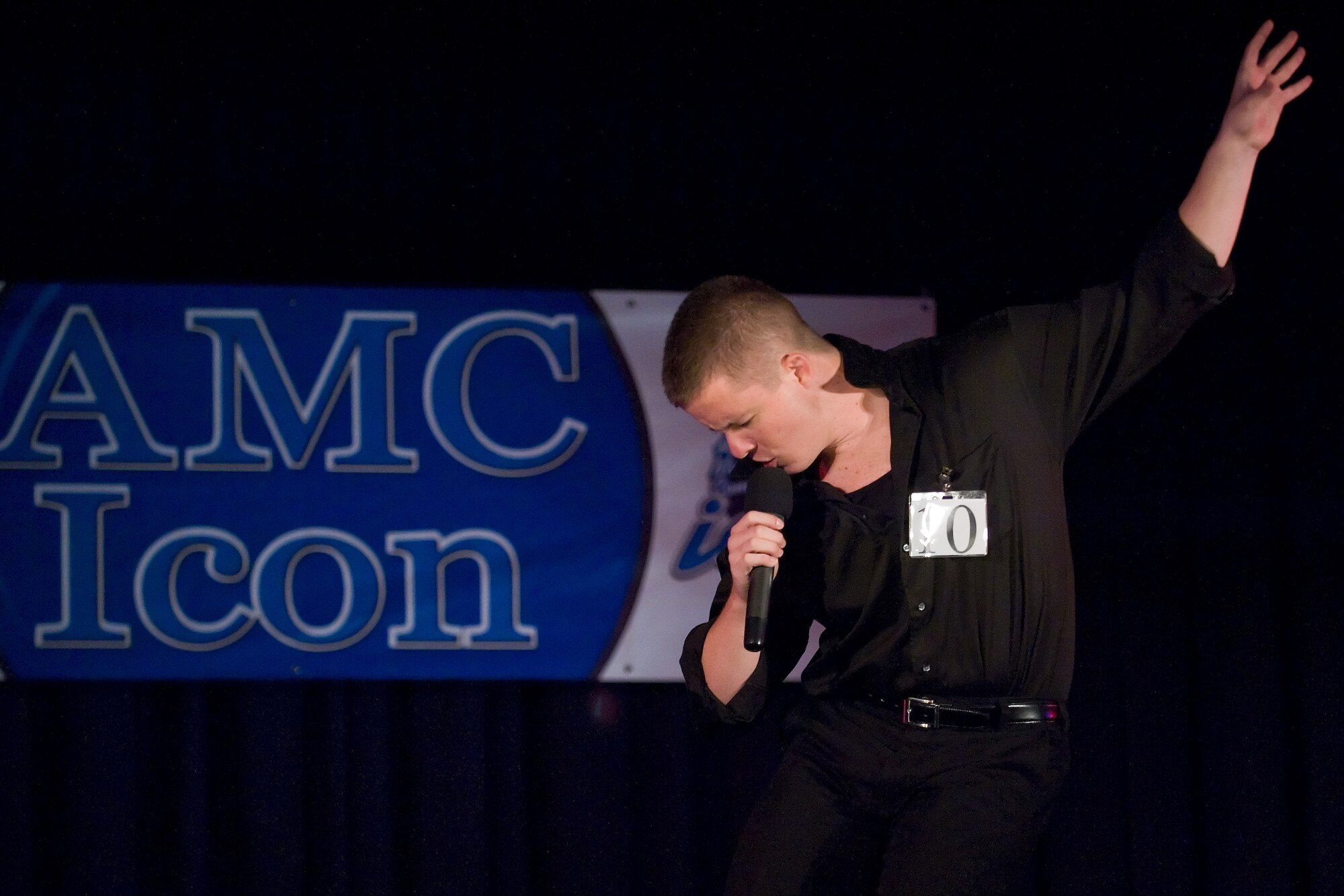 Airman 1st Class Chris Long, 436th Maintenance Squadron, performs during the Air Mobility Command Icon event at The Landings Club Aug. 5, 2010. Airman Long was one of 11 AMC Icon contestants that competed during this year?s event. (U.S. Air Force photo by Roland Balik/Released)