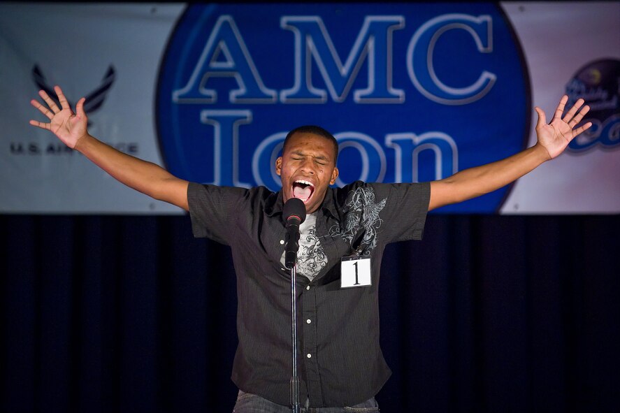 Airman 1st Class Ben Cotton, 436th Operations Support Squadron, performs during the Air Mobility Command Icon event at The Landings Club Aug. 5, 2010. Airman Long was one of 11 AMC Icon contestants that competed during this year?s event. (U.S. Air Force photo by Roland Balik/Released)