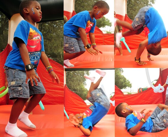 Joseph Wesly goes head over heels for the base library summer reading finale in an inflatable jump castle at the base picnic grounds Aug. 7, 2010, on Joint Base Charleston, S.C. According to base librarians, the summer months are critical for young readers. On average, three to four months of reading skill can be lost while children are out of school. To provide continuing support during the school year, the base library hosts regular activities. Base librarians encourage visiting www.jbcharleston.com to keep up with events on base. Joseph is the son of Beverly and Joseph Wesley and was a guest of Yvette Jones, a family child care provider. (U.S. Air Force photo illustration/Staff Sgt. Daniel Bowles)
