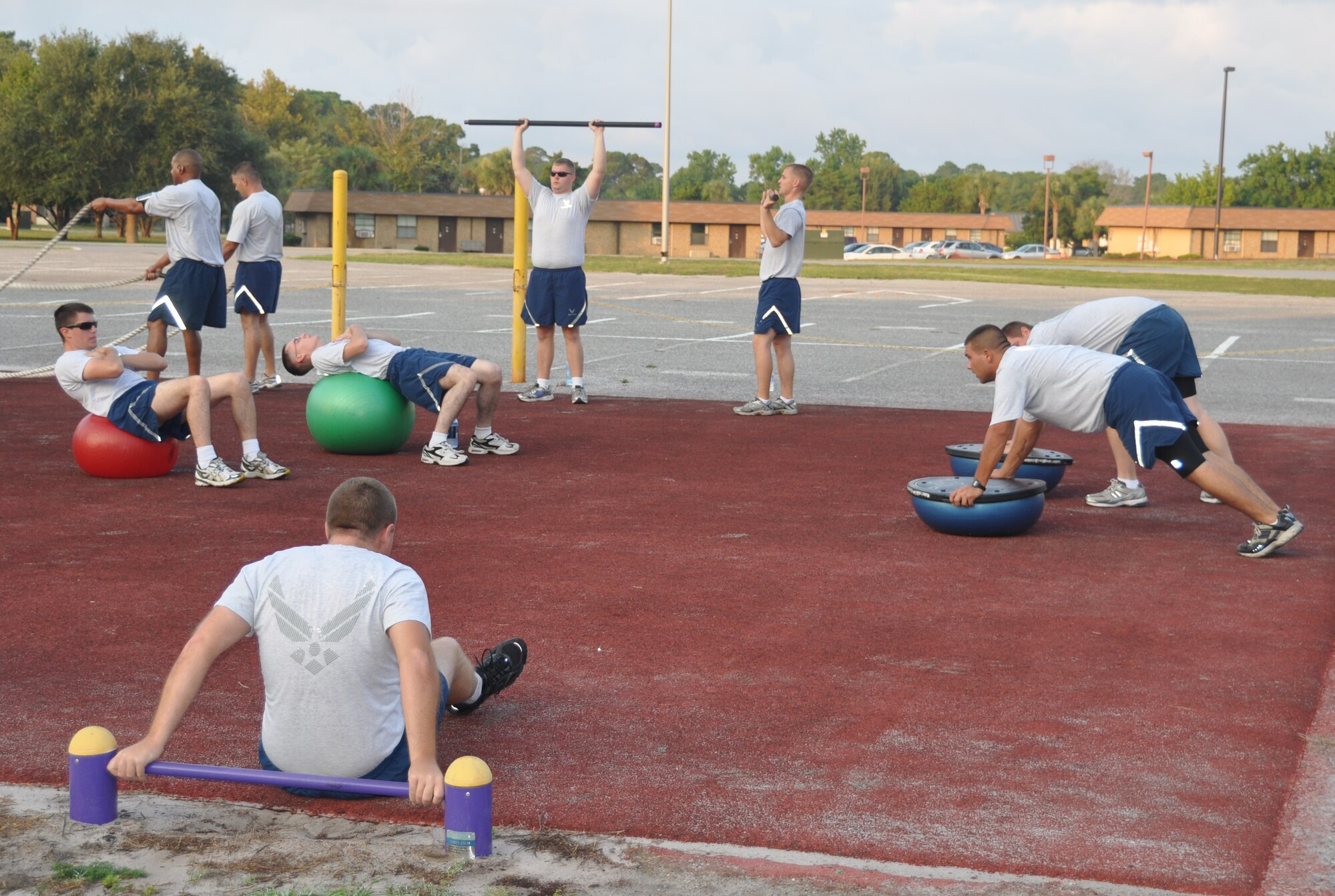 Tyndall Airman practice a series of circuit training exercises during a Boot Camp session at the Health and Wellness Center here.  (U.S. Air Force photo/Senior Airman Veronica McMahon) 
