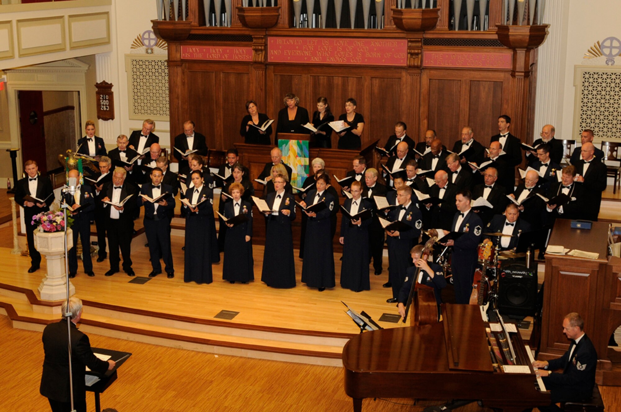 The U.S. Air Force Band Singing Sergeants performed a special alumni concert Aug. 7 at the New York Avenue Presbyterian Church in D.C. The program featured past and present members of the official chorus of the U.S. Air Force. Retired Lt. Col. Craig Jessop, former conductor of the Singing Sergeants and former award-winning conductor of the Mormon Tabernacle Choir, conducted the program. (U.S. Air Force photo by Senior Airman Jaclyn McDonald)