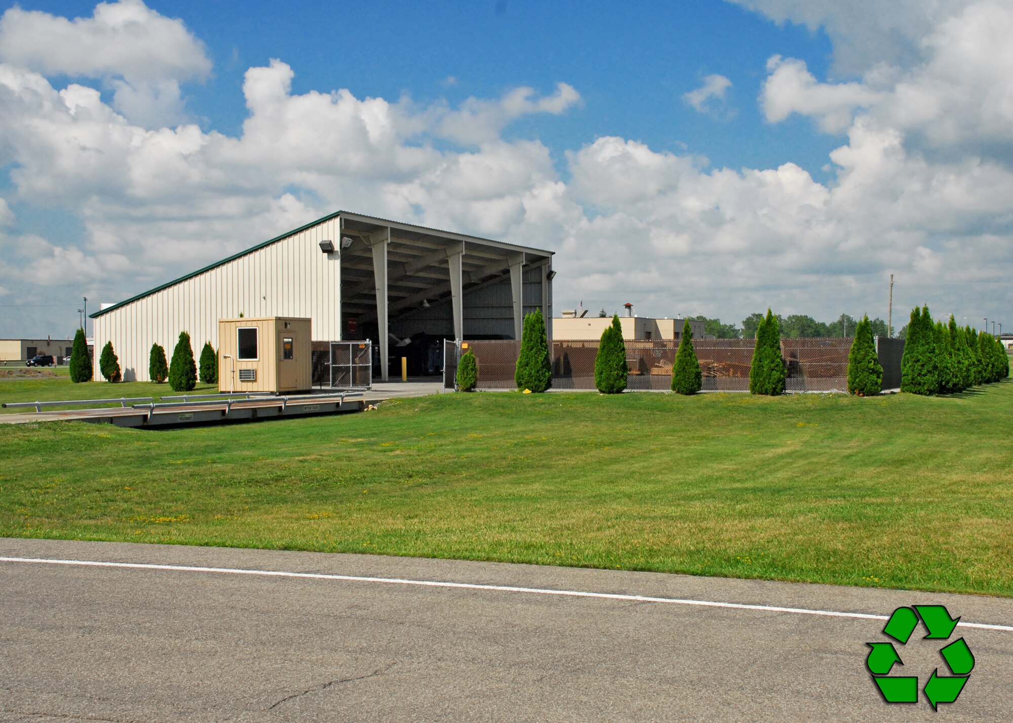The entrance to the Niagara Falls Air Reserve Station Recycling Center is ready to collect recyclables July 30, 2010, Niagara Falls NY. The Niagara Falls Air Reserve Station Recycling Center encourages all members to recycle cardboard, plastic and metal waste whenever possible. (U.S. Air Force photo by Michael Harvey)
