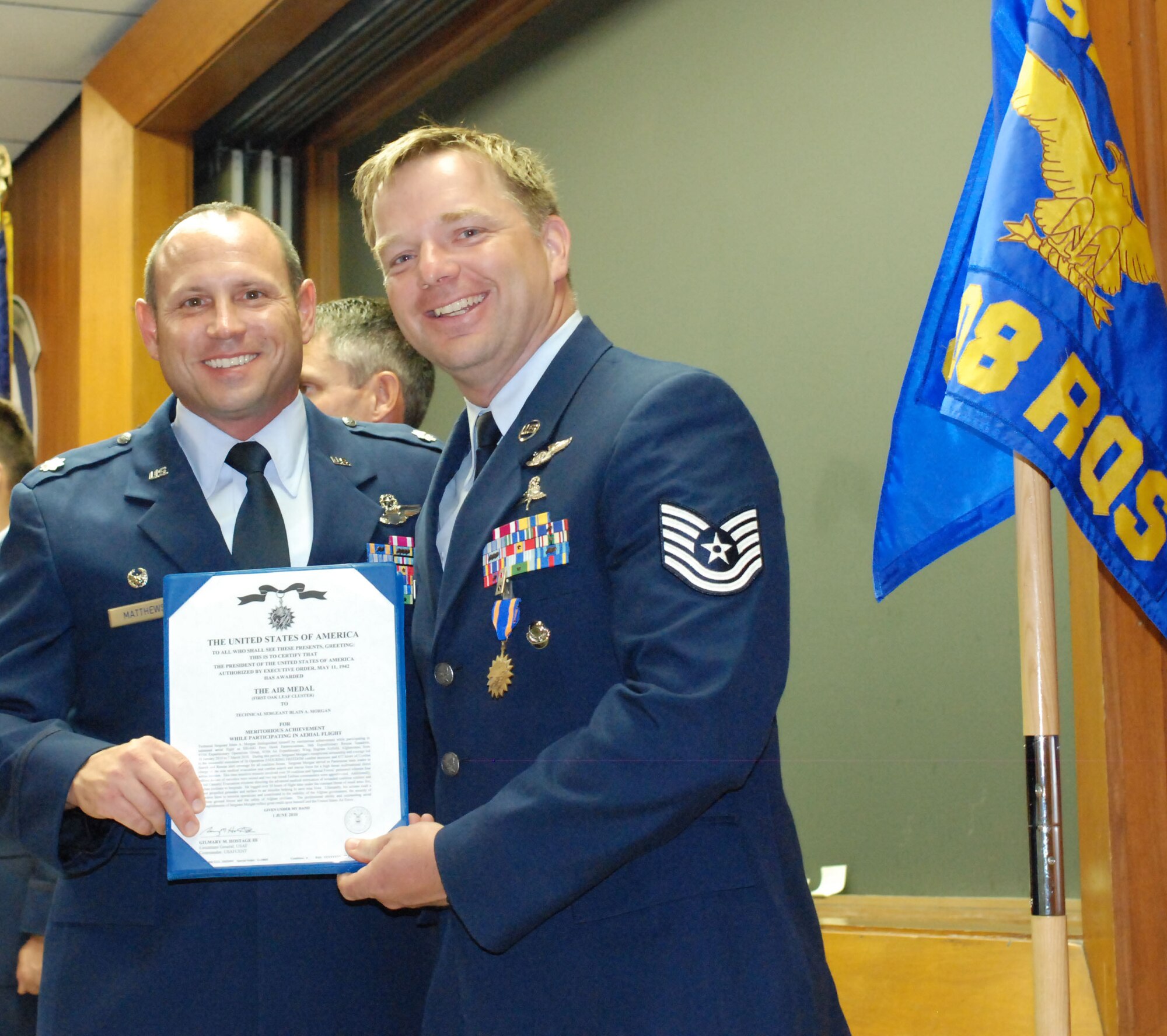PATRICK AIR FORCE BASE, Fla. -- Lt. Col. Kurt Matthews (L) and Tech. Sgt. Blain Morgan after receiving his first of two Air Force Commendation Medals. An Air Force Reserve pararescuemen with the 920th Rescue Wing here, Sergeant Morgan received his awards for his exceptional service helping to rescue and evacuate survivors of 36 avalanches in Salang Pass in Afghanistan. The 920th Rescue Wing Airmen engage in three of the Air Force Reserve's most cutting-edge and satisfying missions: combat search and rescue; space support; and humanitarian assistance. (U.S. Air Force photo/Staff Sgt. Ken Salgat)