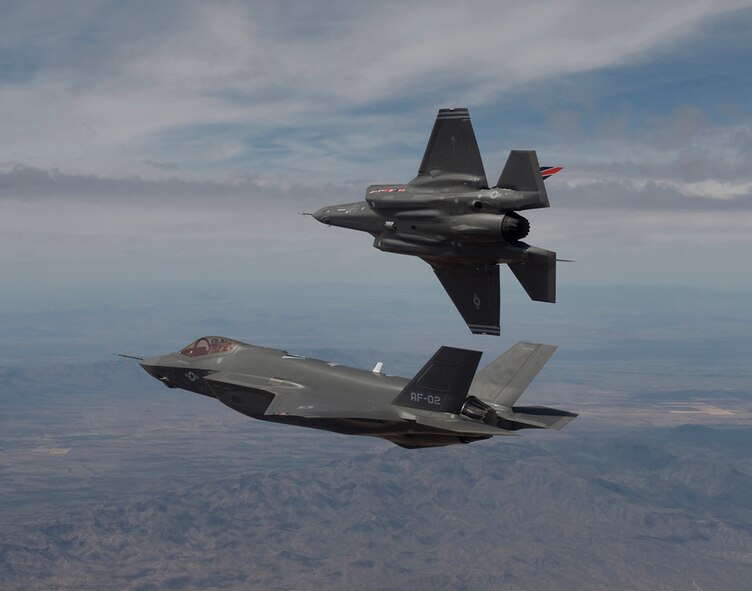 Air Force F-35's number AF-1 and AF-2 arrive at Edwards Air Force Base, Calif., for test and evaluation in May  2005. The Air Force plans to start basing F-35s in 2013 at Hill AFB, Utah, and Luke AFB, Ariz., where Air Force Reserve Command has associate units with Regular Air Force wings. (Lockheed Martin file photo/Tom Reynolds)