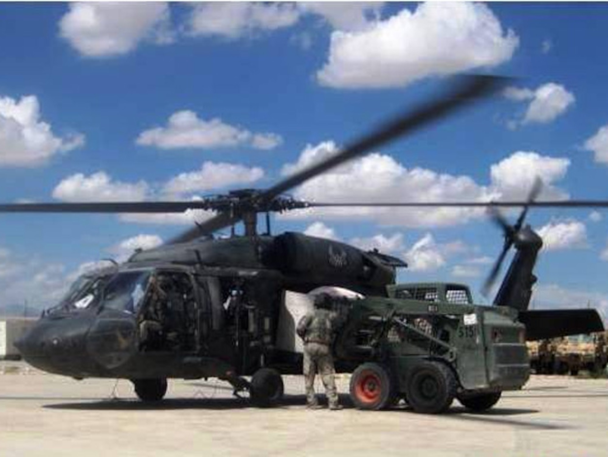Humanitarian assistance supplies are loaded for air transport from Forward Operating Base Smart to the Shinkai District, Zabul province, Aug. 6, 2010. Members of Provincial Reconstruction Team Zabul worked alongside government officials and the Afghan National Army to provides emergency assistance for six villages affected by recent flooding in Shinkai. (Courtesy Photo)