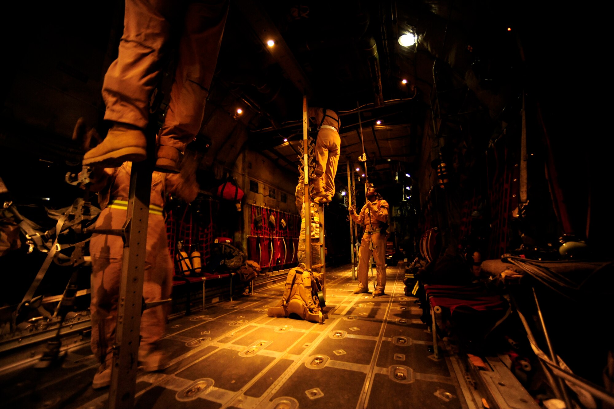 Crew members assigned to the 362nd Expeditionary Aeromedical Evacuation Flight, configure a C-130 Hercules aircraft for an aeromedical evacuation mission during pre-flight inspections at Joint Base Balad, Iraq on July 17, 2010.
(U.S. Air Force photo by Staff Sgt. Andy M. Kin / Released)