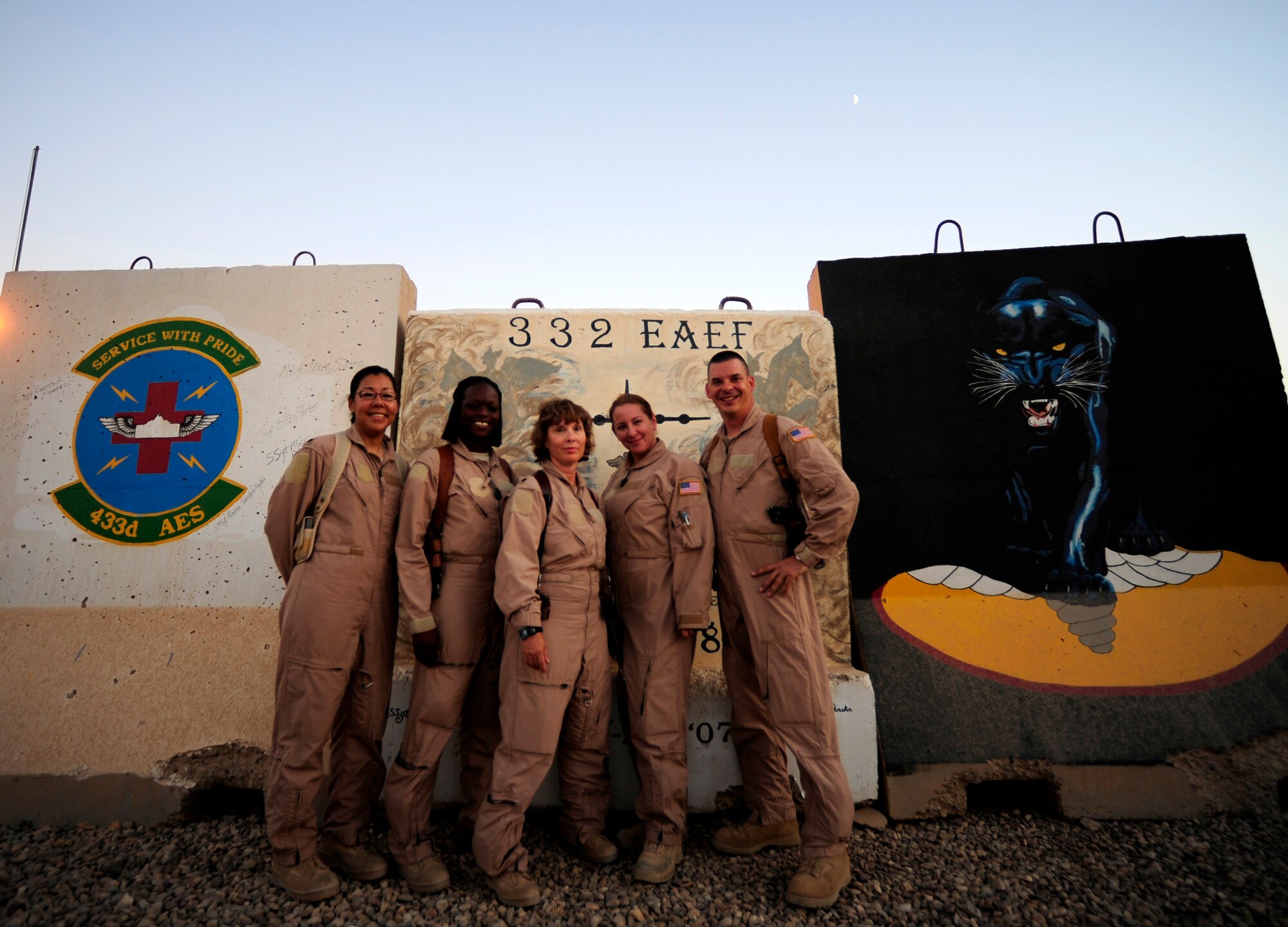 U.S. Air Force 362nd Expeditionary Aeromedical Evacuation Flight, poses for the camera after their crew brief prior to aeromedical evacuation mission at Joint Base Balad, Iraq on July 17, 2010. 
Left to right: Lisa Mayo, Nicole Caldwell, Marty Maddox, Margerite Hellwich and Tony Staut.
(U.S. Air Force photo by Staff Sgt. Andy M. Kin / Released)
