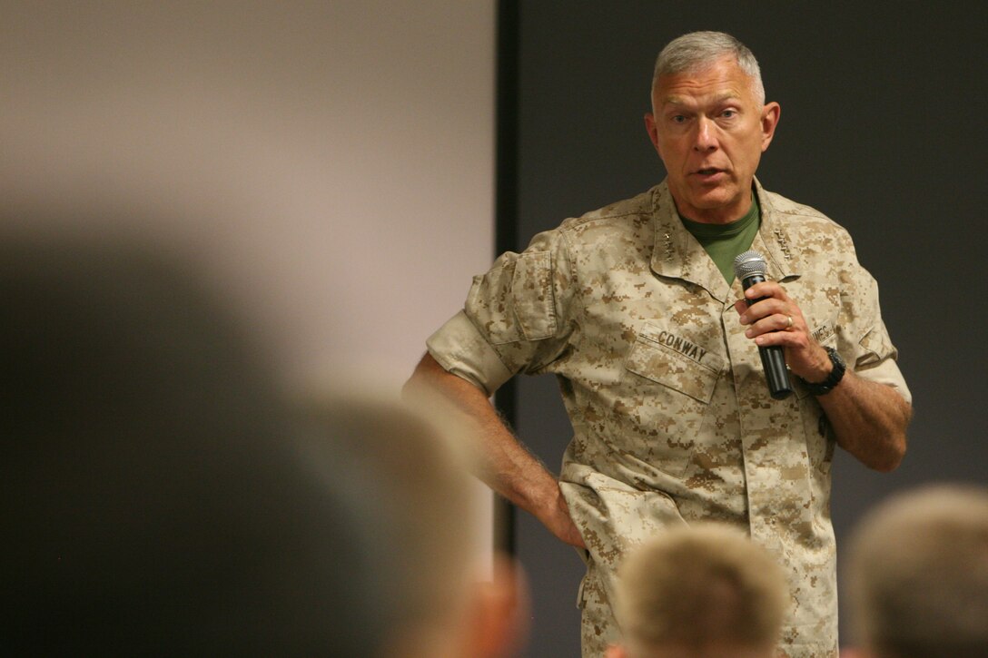 Gen. James T. Conway, Commandant of the Marine Corps, answers a question during a town hall meeting at U.S. Marine Corps Forces, Special Operations Command headquarters. Conway thanked MARSOC Marines and Sailors for their service and dedication during his visit.