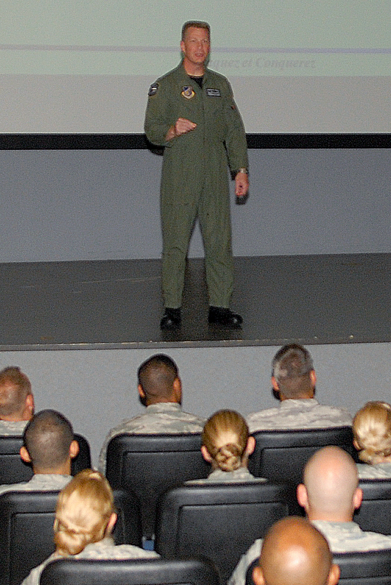 KUNSAN AIR BASE, Republic of Korea -- Col. John Dolan, 8th Fighter Wing commander, speaks to Airmen about policy changes and some of the major issues here Aug. 13. This was Colonel Dolan’s first commander’s call since taking command of the base. (U.S. Air Force photo/Senior Airman Ciara Wymbs) 