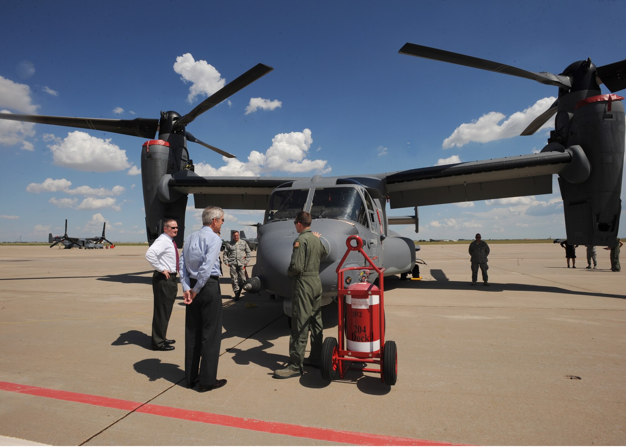 CANNON AIR FORCE BASE, N.M. - New Mexico Senator Jeff Bingaman visited Cannon and received an overview from Capt. Christian Helms, 20th Special Operations Squadron, about  the operations of the CV-22 Osprey August 11. The tour also included other aircrafts like the MC-130W Dragon Spear, the MQ-9 Reaper and MQ-1 Predator. (U.S. Air Force photo by Airman 1st Class Maynelinne De La Cruz)