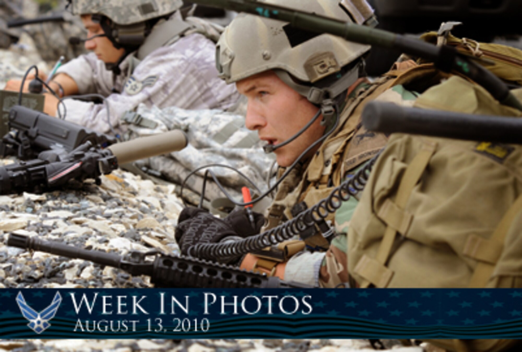 Air Force Week in Photos for Aug. 13, 2010, highlights photos from around the Air Force. In this photo by Senior Airman Caleb Pierce, Senior Airman Rich Garrett (foreground) radios for air cover during a close-air support training mission Aug. 5, 2010, during exercise Allied Strike 10 at Grafenwoehr, Germany. (U.S. Air Force photo illustration/Corey Parrish) 
