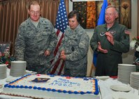 MINOT AIR FORCE BASE, N.D. -- Brig. Gen. Sandra Finan (center), Air Force Global Strike Command Inspector General, Col. Douglas Cox (left), 5th Bomb Wing commander, and Col. Fred Stoss (Right), 91st Missile Wing commander, participate in a cake-cutting ceremony at the Jimmy Doolittle Center here Aug. 12. The ceremony celebrated the first anniversary of Air Force Global Strike Command’s activation on Aug. 7, 2009. (U.S. Air Force photo by Senior Airman Michael J. Veloz)