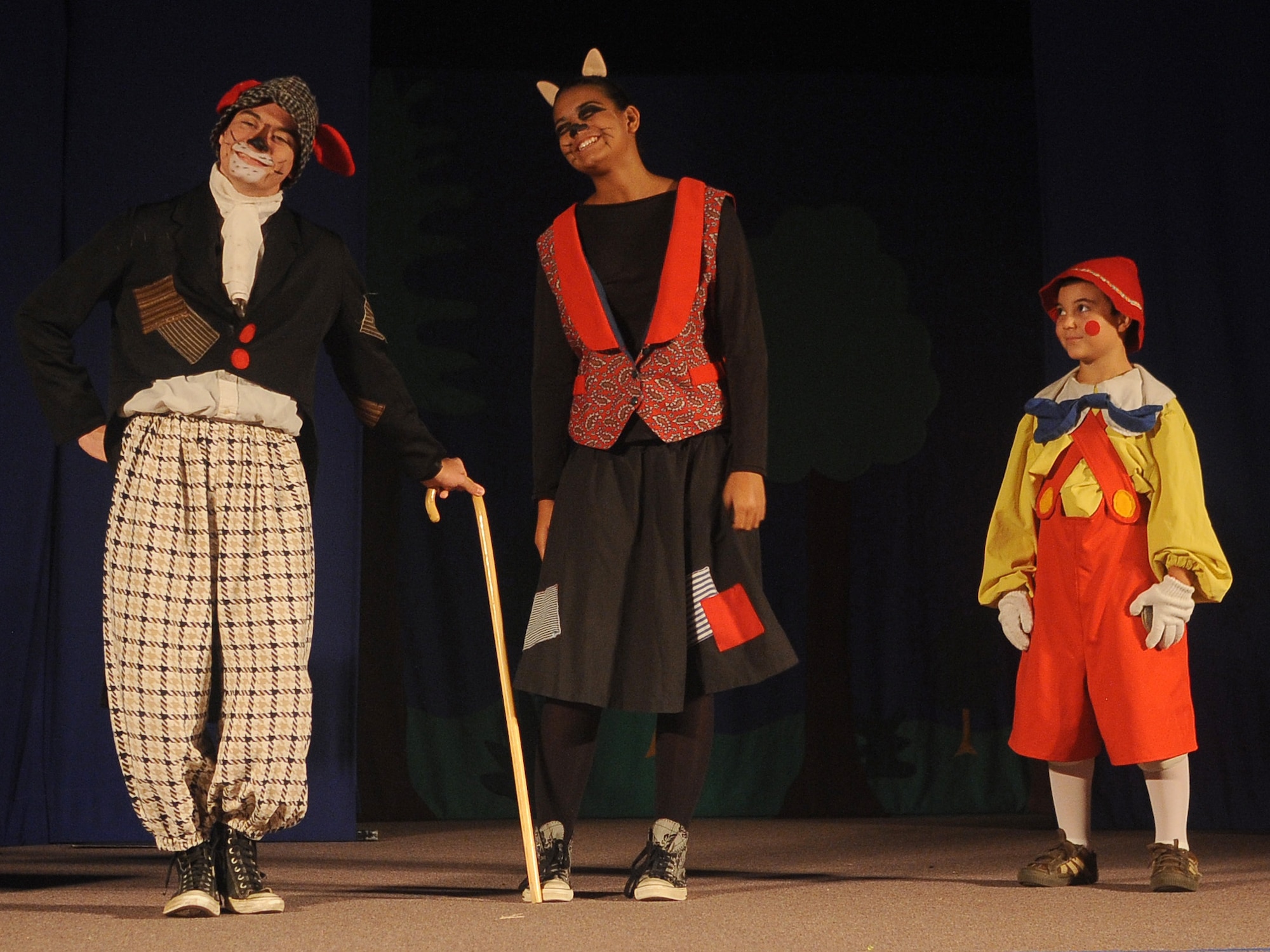 BARKSDALE AIR FORCE BASE, La. - (Left to right) Cory Patton, the Fox, Jordan Crockett, the Cat, and Stephan Danos, Pinocchio, share a scene during the Missoula Theatre production of ?Pinocchio? Aug. 6 at Hoban Hall. The Missoula Children?s Theatre is a company that travels throughout the United States and to 17 other countries, to help children from each community to put on a play in a week?s time. (U.S. Air Force photo/Senior Airman Amber Ashcraft) (RELEASED)