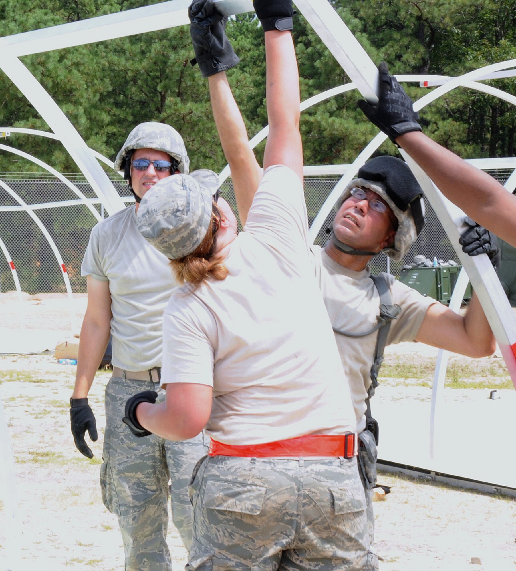 Members of the 108th Contingency Response Group work to conduct an airbase opening during the Eagle Flag exercise Aug. 5 at Joint Base McGuire-Dix-Lakehurst. Airbase opening is the process of transitioning a runway and surrounding environment into a location capable of supporting an operational status for follow-on forces or further relief efforts. (U.S. Air Force photo/Airman 1st Class Bryan Swink)