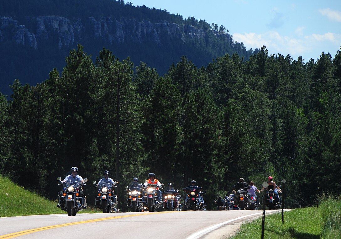 ELLSWORTH AIR FORCE BASE, S.D. -- Hundreds of bikers ride on the highway during the Dakota Thunder bike ride to Sturgis S.D., Aug. 10.  The bikers rode 57 miles though the Black Hills in a staggered formation of more than 500 bikers. (U.S. Air Force photo/Airman 1st Class Anthony Sanchelli)