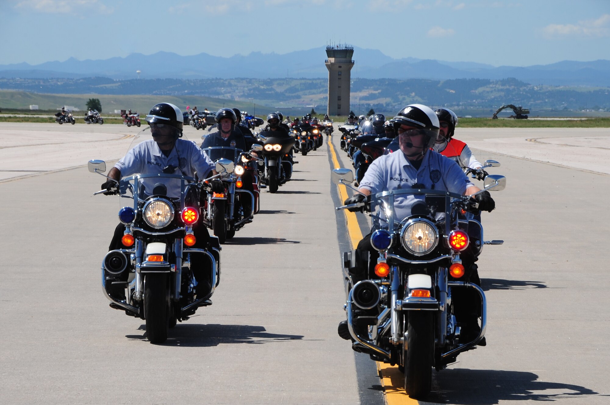 ELLSWORTH AIR FORCE BASE, S.D. -- Hundreds of bikers ride on the flightline during the Dakota Thunder bike ride to Sturgis S.D., Aug. 10.  Sturgis police escorted the group of more than 500 riders. (U.S. Air Force photo/Airman 1st Class Anthony Sanchelli)