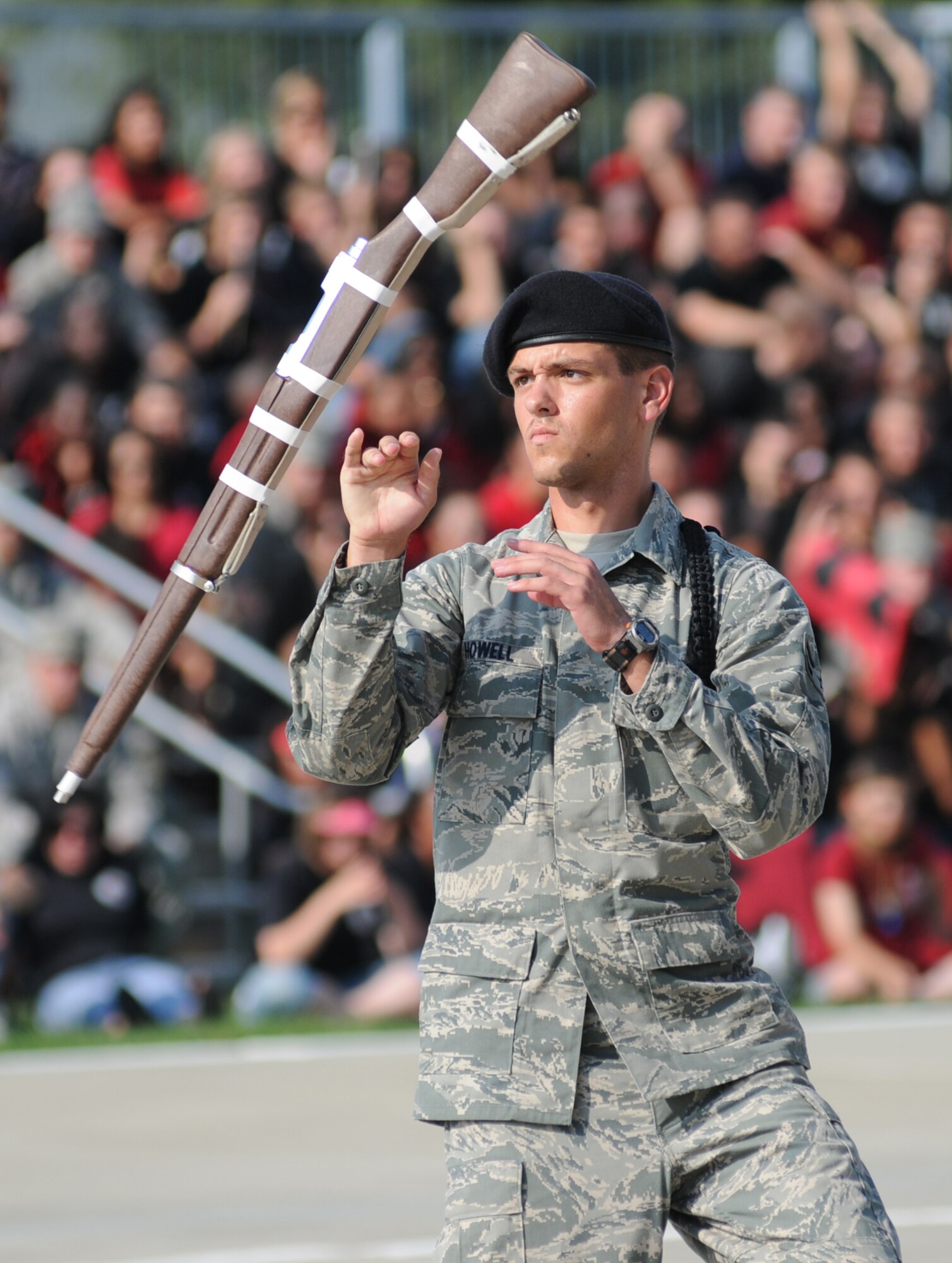 Airman 1st Class James Howell, 335th TRS, twirls his rifle during the freestyle drill competition.  His squadron placed second in the freestyle drill category.  (U.S. Air Force photo by Kemberly Groue)