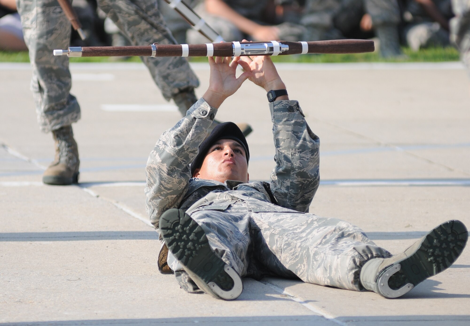 Airman Basic Chance Walker, 335th TRS, hits the ground during the freestyle competition.  His squadron placed second in that category.  (U.S. Air Force photo by Kemberly Groue)