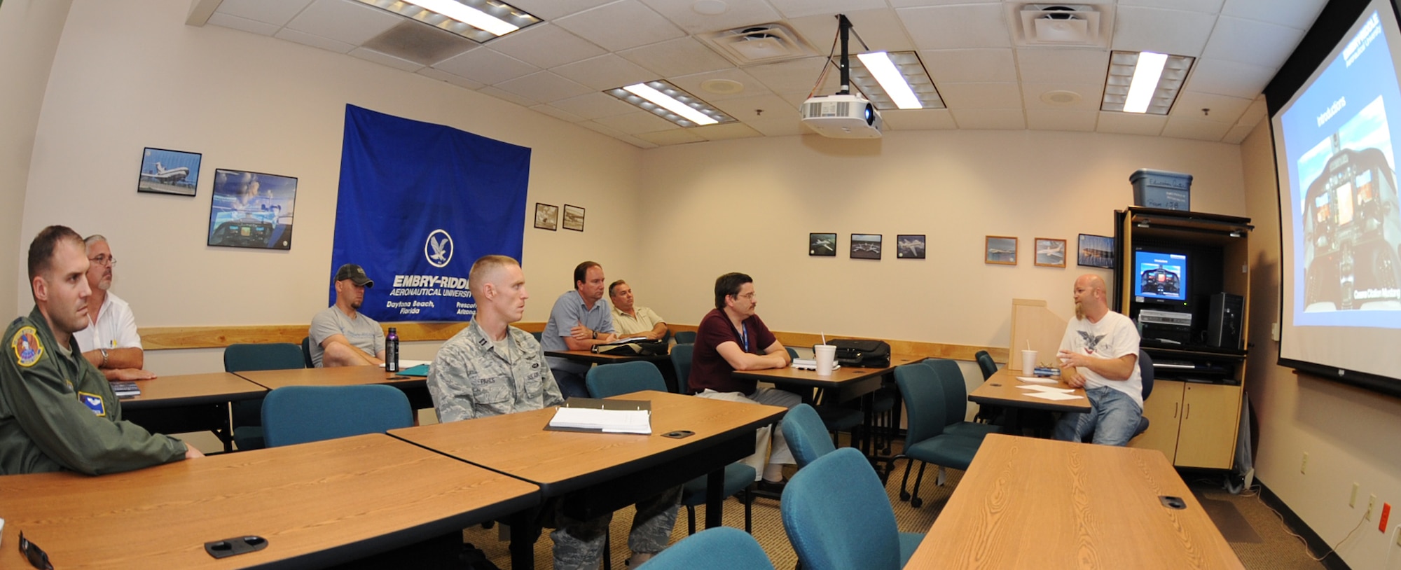 David Thompson, Embry-Riddle Aeronautical University instructor, speaks to students about the class curriculum during the start of the Aviation/Aerospace Simulation Systems class at the Robert J. Dole Community Center Aug. 10, 2010, McConnell Air Force Base, Kan.  The university currently has approximately 200 online and on-site students attending the first nine weeks of the fall semester.  Classes like this one are available for military spouses in the Military Spouse Career Advancement Account Program.  The program is scheduled to be reinstated Oct. 25, 2010 under new regulations.  (U.S. Air Force photo/Senior Airman Maria Ruiz)