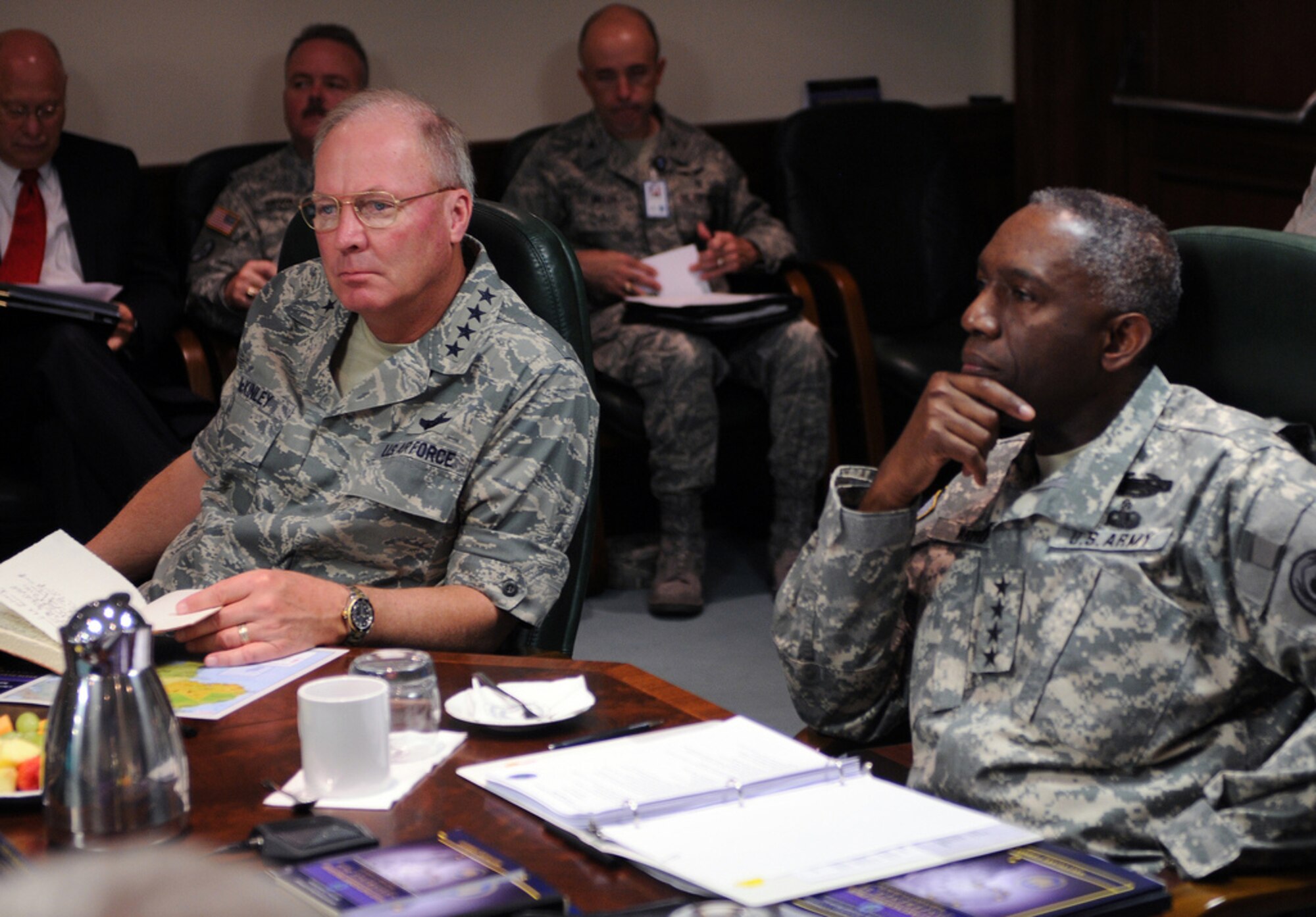 Air Force Gen. Craig McKinley, the chief of the National Guard Bureau, and
Army Gen. William "Kip" Ward, commander of U.S. Africa Command, meet with
National Guard adjutants general and Defense Department leaders at the 2010
National Guard State Partnership Program Conference at Kelley Barracks in
Stuttgart, Germany, on Aug. 11, 2010. The 62-nation SPP is a superb tool for
Africa Command, the combatant commander has said.
