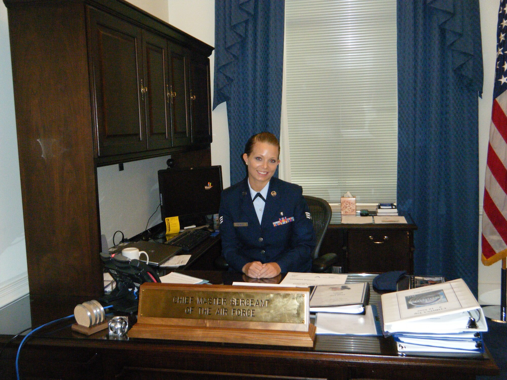 WASHINGTON, D.C. – Senior Airman Amanda Goralski, 23rd Medical Group bioenvironmental engineering technician, visits the desk of the Chief Master Sergeant of the Air Force, Chief James Roy, July 27. “It was amazing sitting at the desk of the highest enlisted person in the Air Force knowing that so many important decisions are made there,” she said. “Those decisions impact the Air Force and ultimately my career as an Airman.” (U.S. Air Force photo by Chief Master Sgt. Richard Parsons/RELEASED)