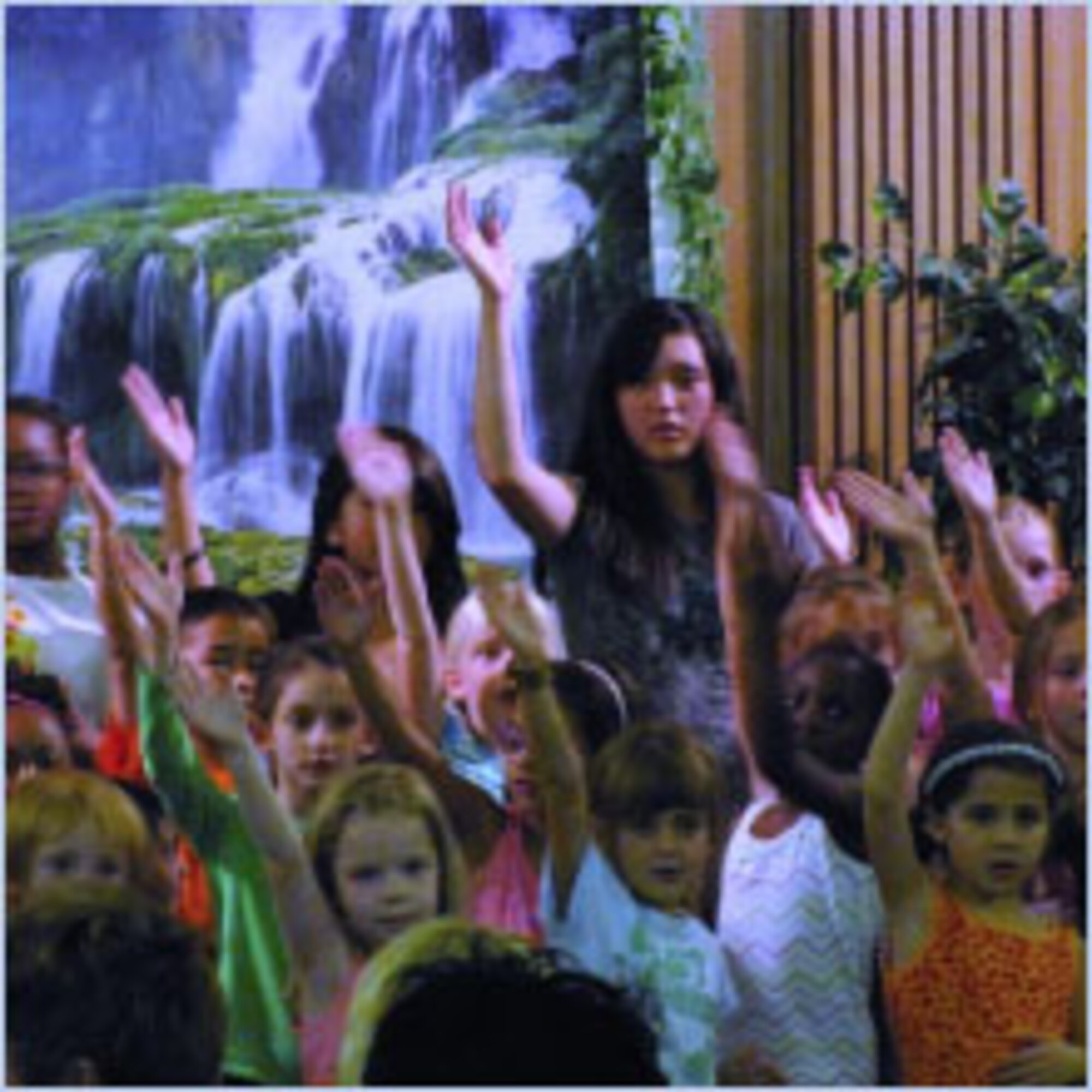 Participants of the Base Chapel's Vacation Bible School enact choreographed songs during a concert held Aug. 6. (Air Force photo by Lee Anne Hensley)