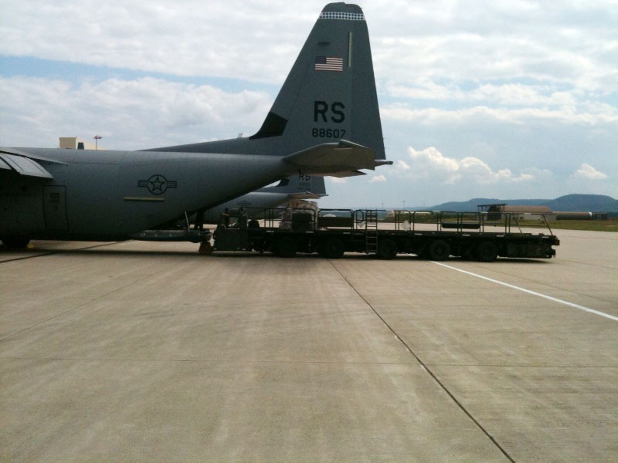 RAMSTEIN AIR BASE, Germany -- U.S. airmen load pallets of firefighting equipment onto a C-130J, bound for Russia, here Aug 13, 2010. The equipment is part of a joint U.S. Air Forces Europe, U.S. Naval Forces Europe/Africa, Marine Forces Europe and U.S. Army Europe effort to assist the Russian government in fighting the wildfires in the country. (U.S. Air Force photo by Master Sgt. Keith Houin)