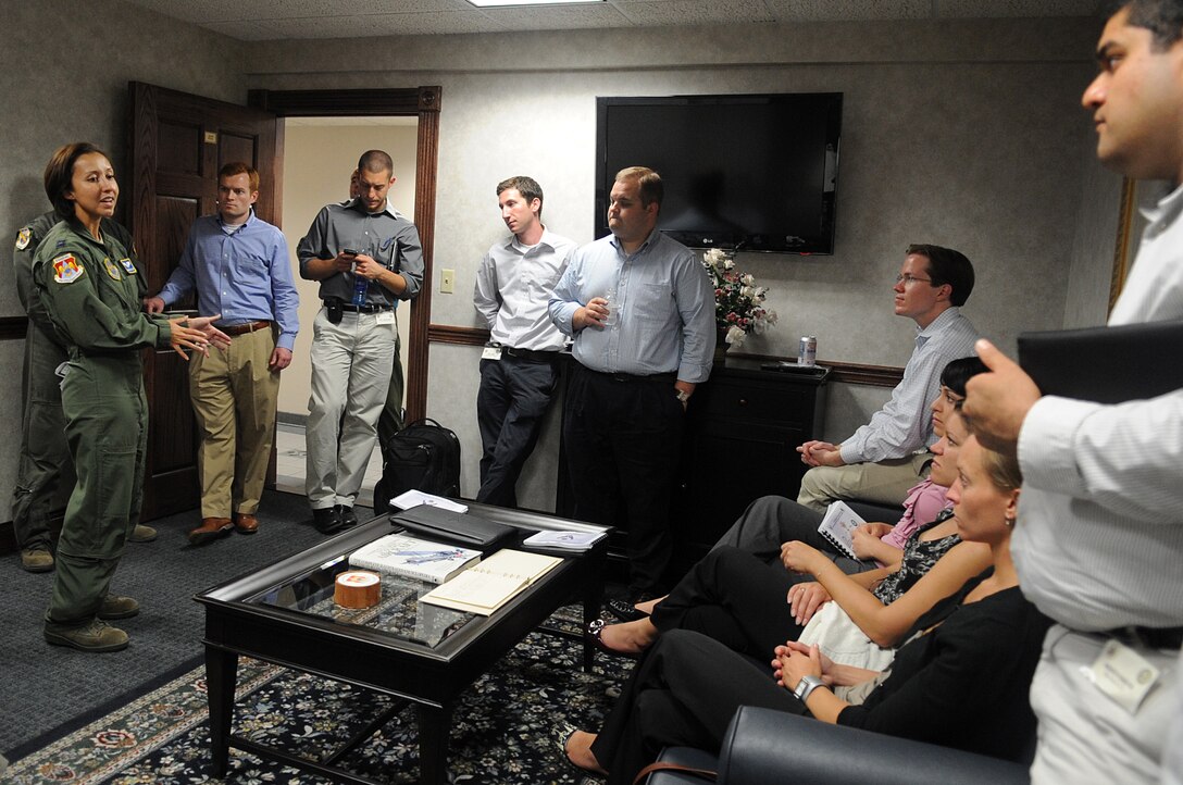Capt. Adrianne Ketelsen, 375th Aeromedical Evacuation Squadron aeromedical evacuation nurse, briefs members of the congressional delegation on the simulated aeromedical evacuation that a team will be performing on a C-130J on the way to Joint Base Andrews, Md., 12 August 2010. 16 members of the congressional delegation flew from Andrews to Scott Air Force Base, Il. to tour Headquarters Air Mobility Command and meet with General Raymond E. Johns Jr., Commander HQ AMC. (U.S. Air Force photo by Senior Airman Melissa V. Brownstein))