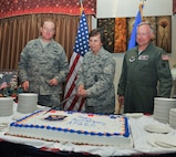 MINOT AIR FORCE BASE, N.D. -- Brig. Gen. Sandra Finan (center), Air Force Global Strike Command Inspector General, Col. Douglas Cox (left), 5th Bomb Wing commander, and Col. Fred Stoss (Right), 91st Missile Wing commander, participate in a cake-cutting ceremony at the Jimmy Doolittle Center here Aug. 12. The ceremony celebrated the first anniversary of Air Force Global Strike Command’s activation on Aug. 7, 2009. (U.S. Air Force photo by Senior Airman Michael J. Veloz)