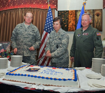 MINOT AIR FORCE BASE, N.D. -- Brig. Gen. Sandra Finan (center), Air Force Global Strike Command Inspector General, Col. Douglas Cox (left), 5th Bomb Wing commander, and Col. Fred Stoss (Right), 91st Missile Wing commander, participate in a cake-cutting ceremony at the Jimmy Doolittle Center here Aug. 12. The ceremony celebrated the first anniversary of Air Force Global Strike Command’s activation on Aug. 7, 2009. (U.S. Air Force photo by Senior Airman Michael J. Veloz)