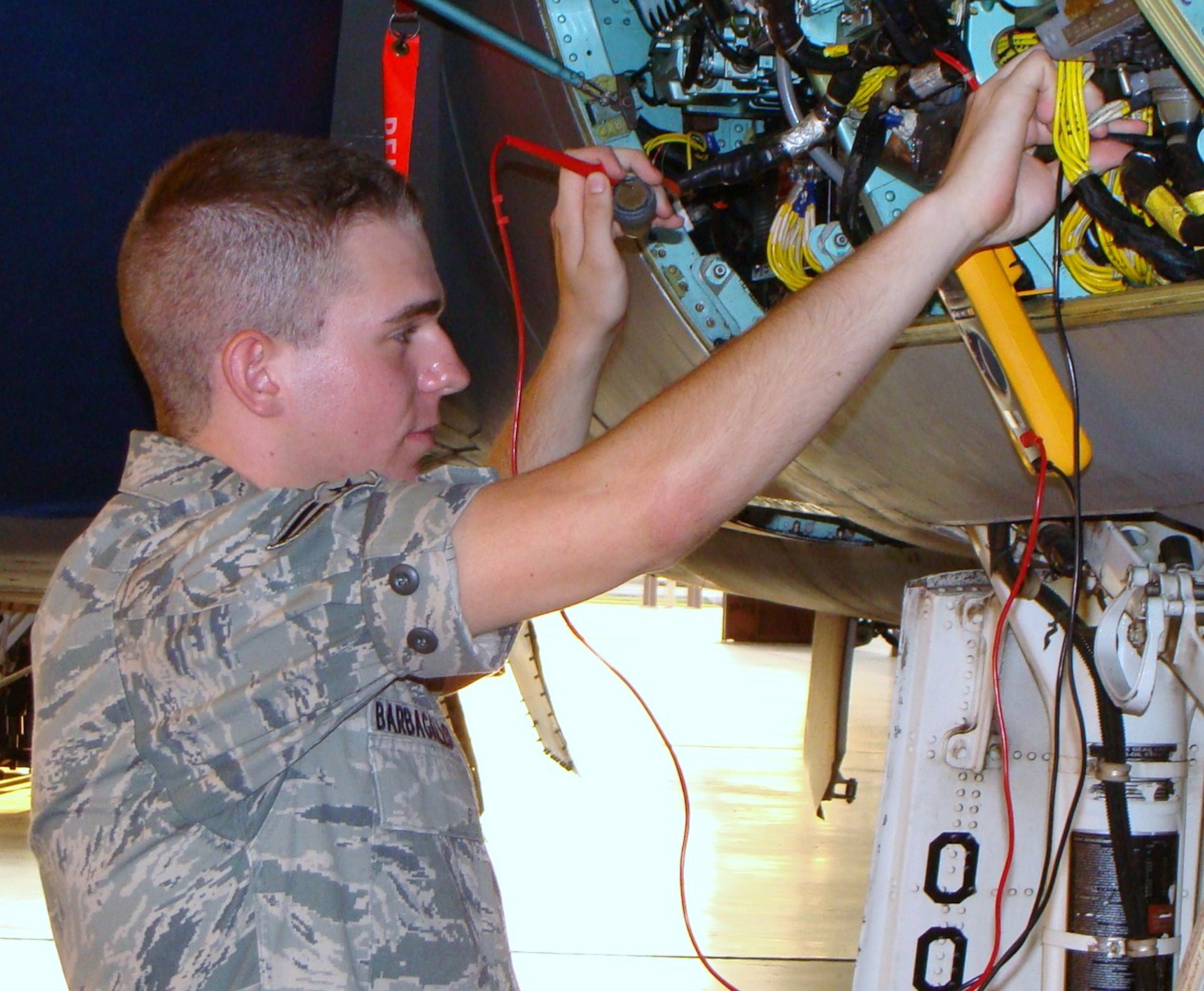 Airman 1st Class Paul Barbagallo troubleshoots a transformer rectifier malfunction during class Aug. 12 at the Electrical and Environmental Apprentice course at Sheppard Air Force Base, Texas.  Airman Barbagallo, 364th Training Squadron student, scored a perfect 100 percent on all block tests and was recognized as an Ace Award winner for the course.  The course provides training in the knowledge and skills needed to perform maintenance on aircraft and environmental systems; to include aircraft familiarization, maintenance data collection, troubleshooting techniques, wiring, and utility and oxygen systems.  (U.S. Air Force photo/Tech. Sgt. Vernon Cunningham)