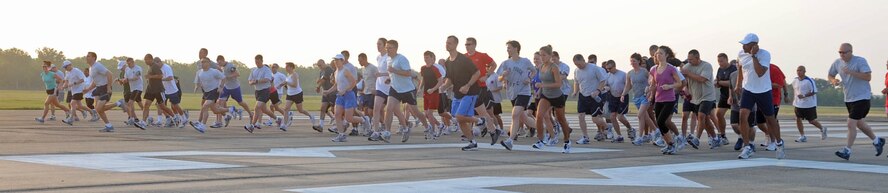 BARKSDALE AIR FORCE BASE, La. -- Several members from Air Force Global Strike Command begin to start running the 5K Fun Run Aug. 13 on the flightline. The Fun Run was the first event of many for the first-year anniversary of the stand-up of AFGSC. Other events included a golf tournament, dodge-ball, bowling and basketball. An award ceremony at Hoban Hall followed the events. (U.S. Air Force photo by Senior Airman Alexandra M. Boutte) (RELEASED)