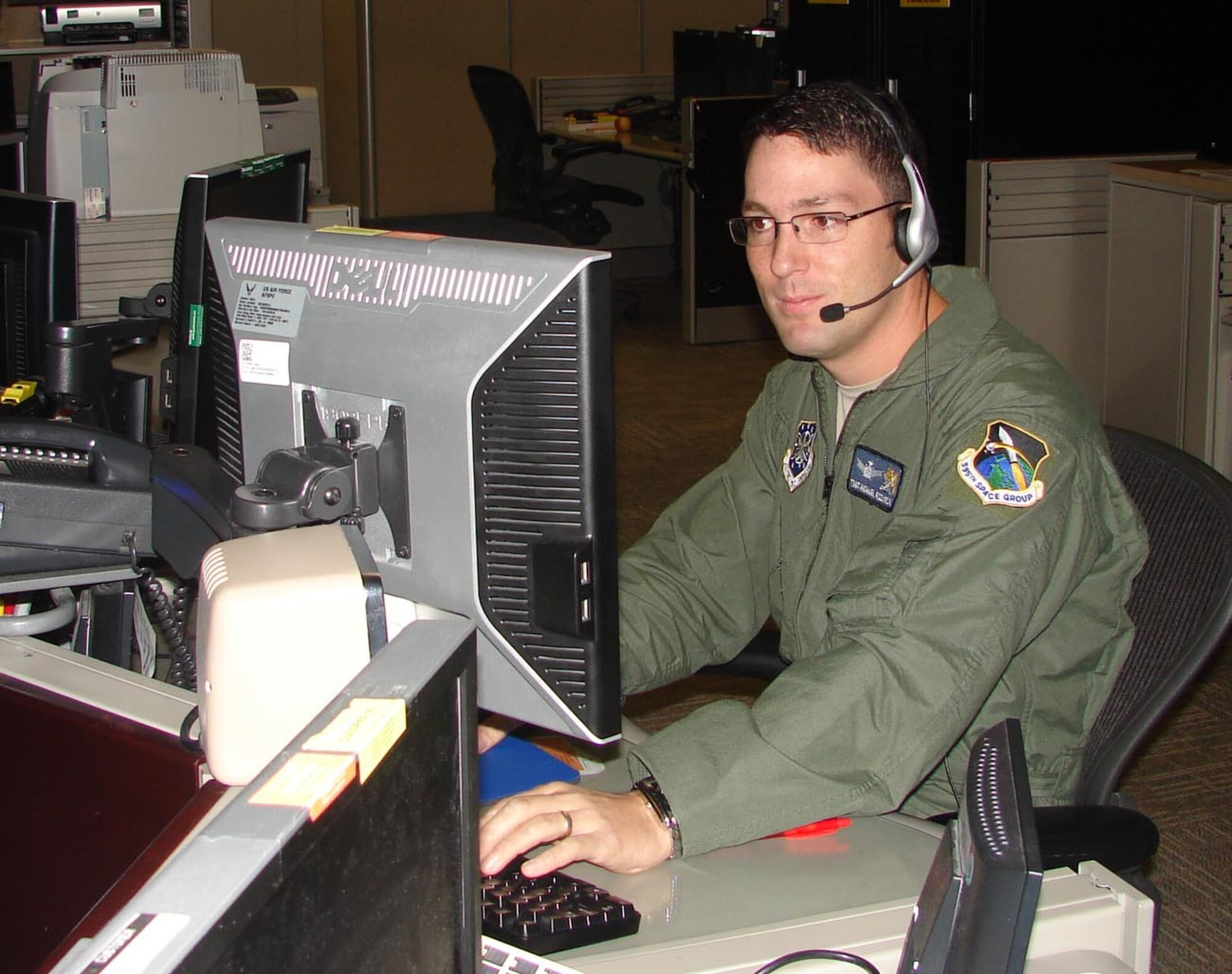 SCHRIEVER AIR FORCE BASE, Colo. -- Tech. Sgt. Michael Rozneck, 3rd Space Experimentation Squadron at Schriever AFB, won the noncommissioned officer category at the Air Force Level for the 2009 Enlisted Space Systems Operator of the Year Award. Sergeant Rozneck was nominated for his work at the 613th Air Operations Center at Hickam AFB before arriving at Schriever AFB in June. (U.S. Air Force photo by Capt. Jonah Torres)
